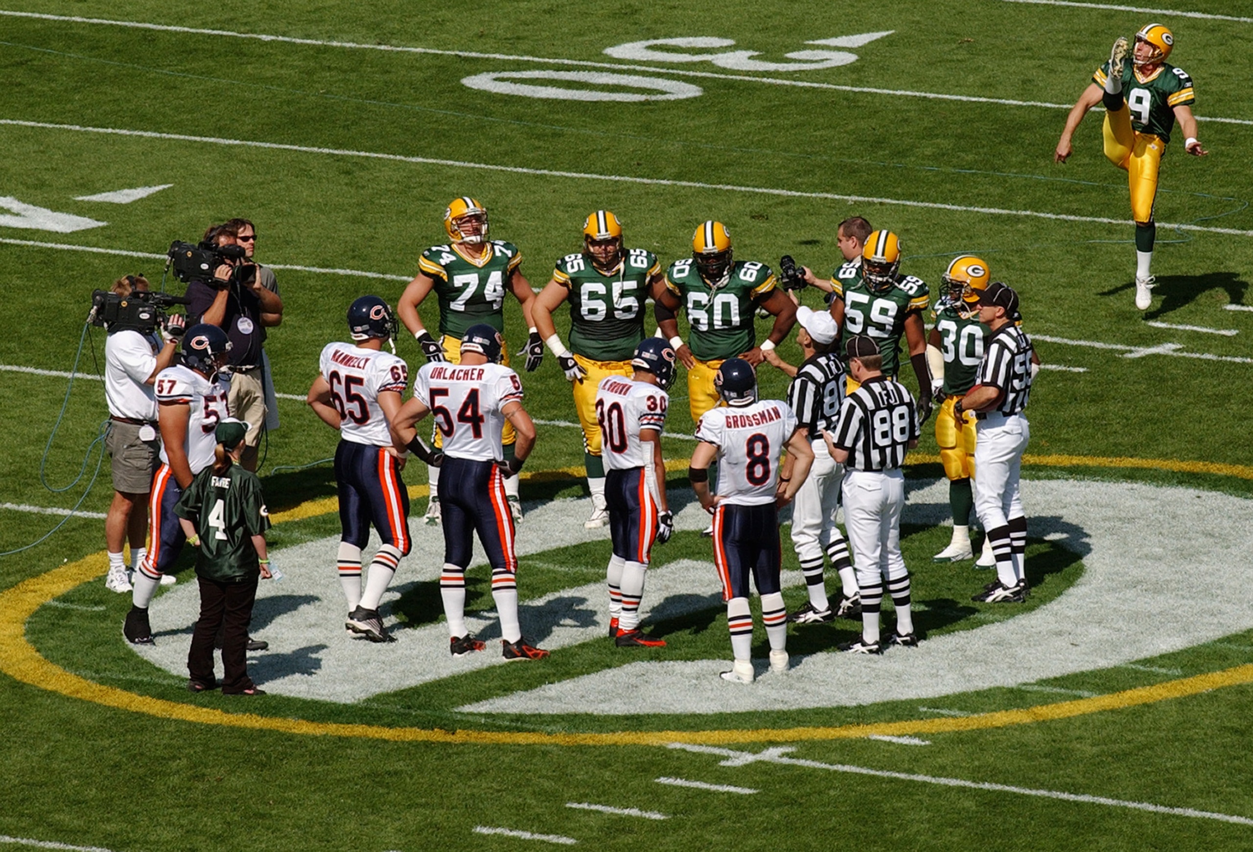 GREEN BAY, WI - SEPTEMBER 19:  A general view of the coin toss prior to the start of the game between the Green Bay Packers and Chicago Bears on September 19, 2004 at Lambeau Field in Green Bay, Wisconsin. The Bears defeated the Packers 21-10. (Photo by J