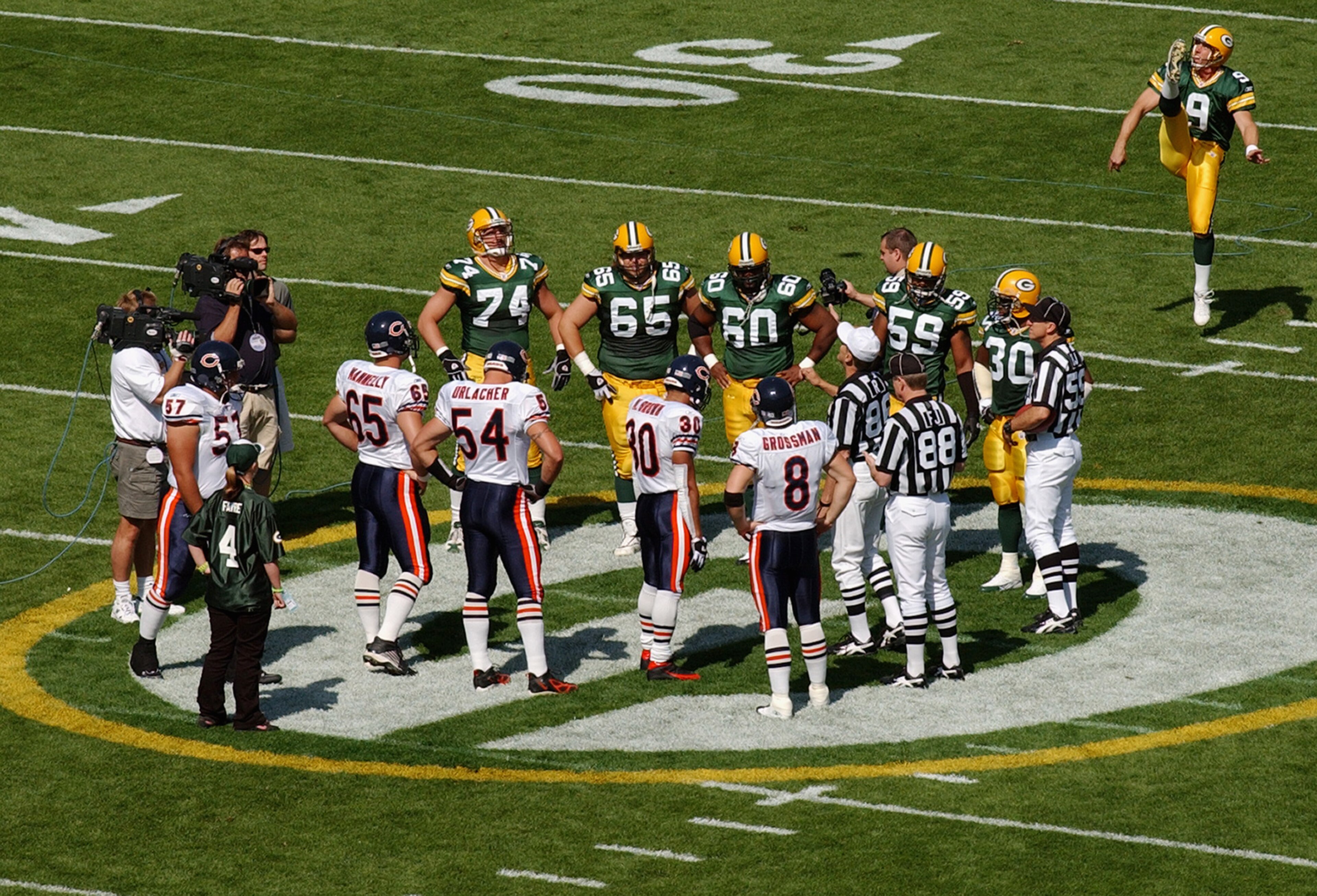 GREEN BAY, WI - SEPTEMBER 19:  A general view of the coin toss prior to the start of the game between the Green Bay Packers and Chicago Bears on September 19, 2004 at Lambeau Field in Green Bay, Wisconsin. The Bears defeated the Packers 21-10. (Photo by J