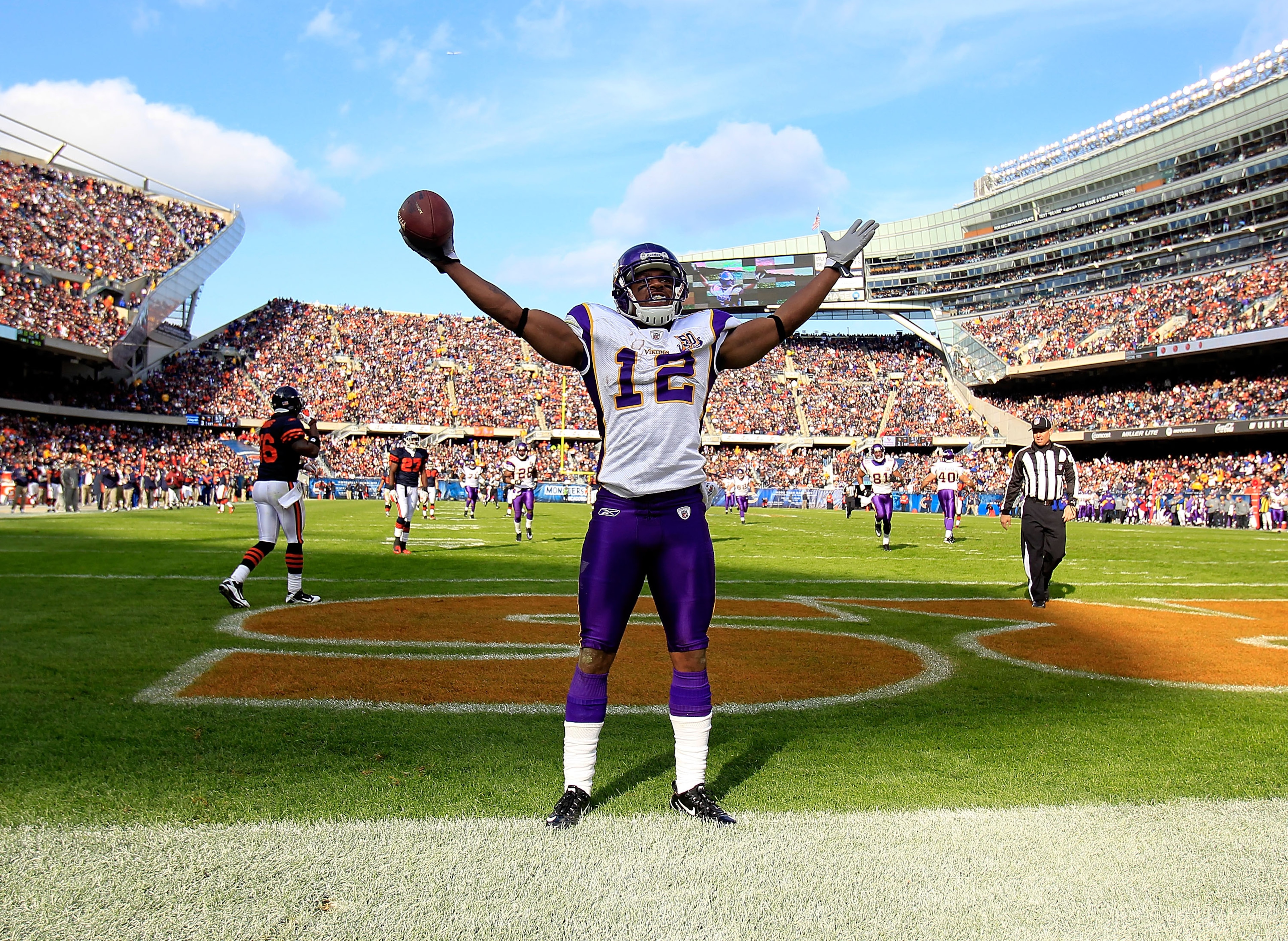 CHICAGO - NOVEMBER 14: Percey Harvin #12 of the Minnesota Vikings celebrates a touchdown catch against the Chicago Bears at Soldier Field on November 14, 2010 in Chicago, Illinois. The Bears defeated the Vikings 27-13. (Photo by Jonathan Daniel/Getty Imag CHICAGO - NOVEMBER 14: Percey Harvin #12 of the Minnesota Vikings celebrates a touchdown catch against the Chicago Bears at Soldier Field on November 14, 2010 in Chicago, Illinois. The Bears defeated the Vikings 27-13. (Photo by Jonathan Daniel/Getty Imag