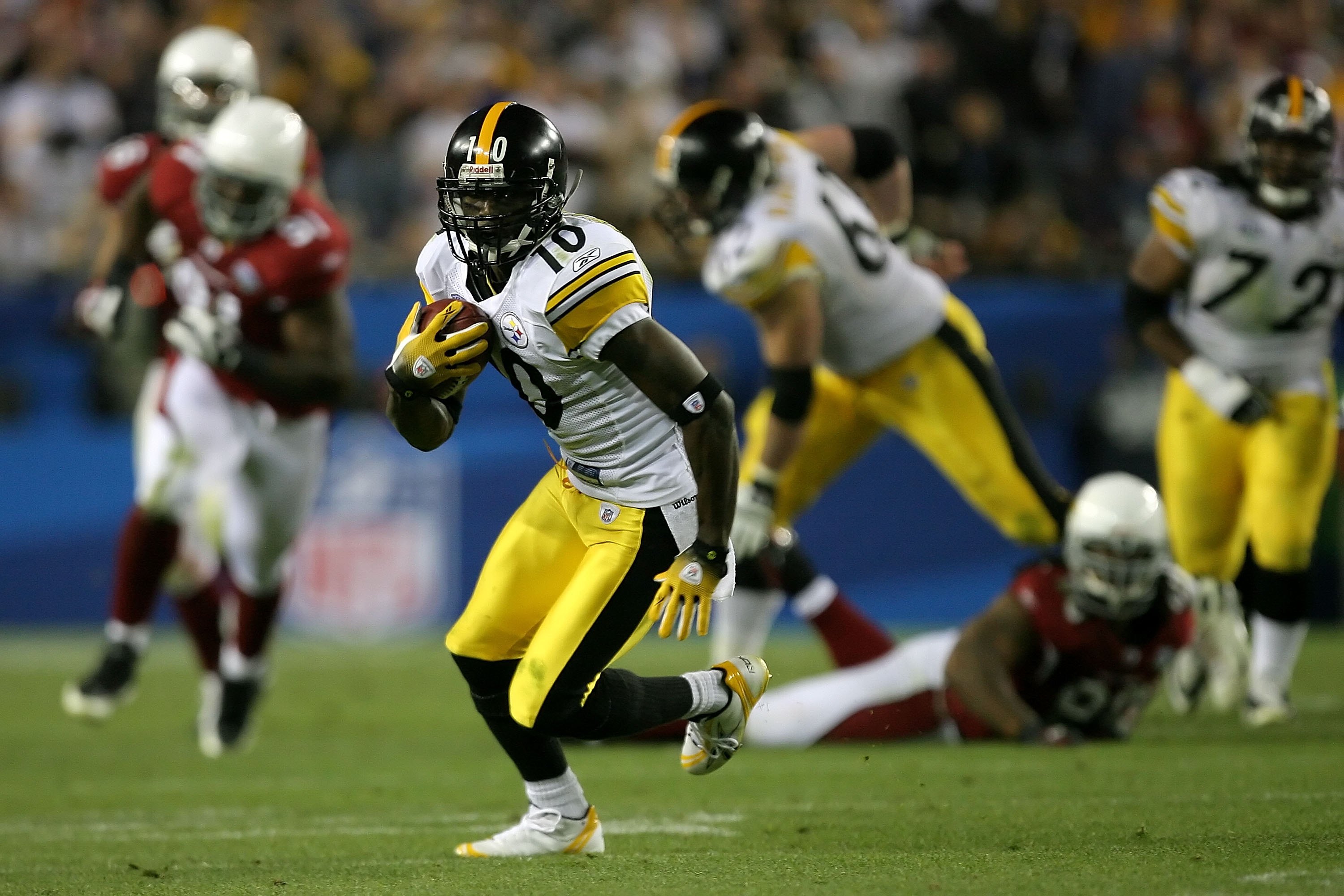 Arizona Cardinals wide receiver Anquan Boldin picks up 11 yards against  Pittsburgh Steelers corner back Ike Taylor in the fourth quarter of Super  Bowl XLIII at Raymond James Stadium in Tampa, Florida