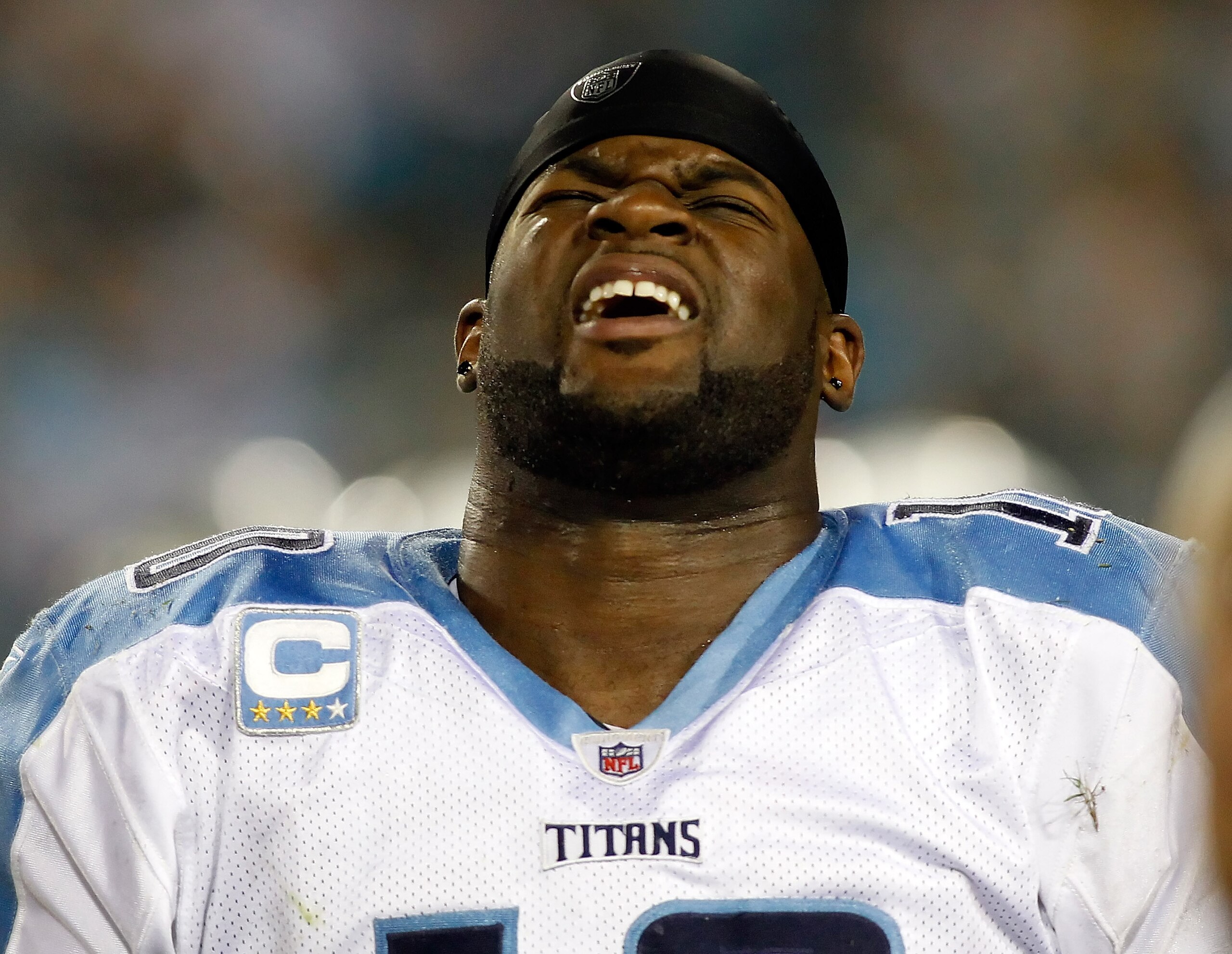 JACKSONVILLE, FL - OCTOBER 18:  Quarterback Vince Young #10 of the Tennessee Titans grimaces in pain during the first quarter against the Jacksonville Jaguars during the game at EverBank Field on October 18, 2010 in Jacksonville, Florida.  (Photo by J. Me