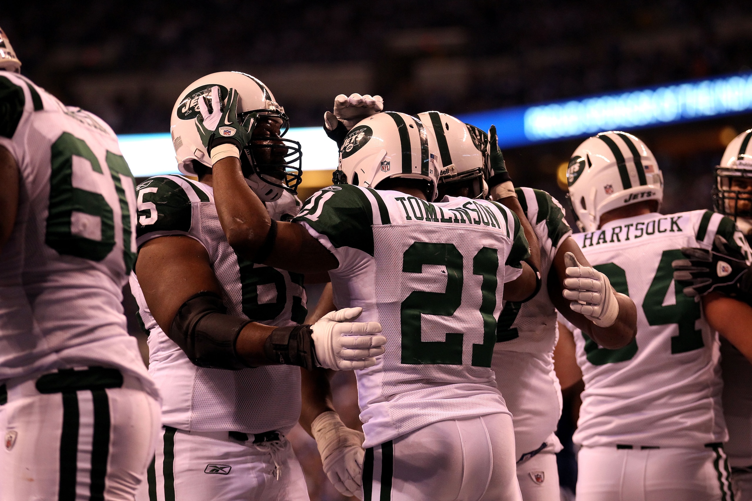 INDIANAPOLIS, IN - JANUARY 08: LaDainian Tomlinson #21 of the New York Jets celebrateswith teammates after he scored a 1-yard rushing touchdown in the fourth quarter against the Indianapolis Colts during their 2011 AFC wild card playoff game at Lucas Oil INDIANAPOLIS, IN - JANUARY 08: LaDainian Tomlinson #21 of the New York Jets celebrateswith teammates after he scored a 1-yard rushing touchdown in the fourth quarter against the Indianapolis Colts during their 2011 AFC wild card playoff game at Lucas Oil
