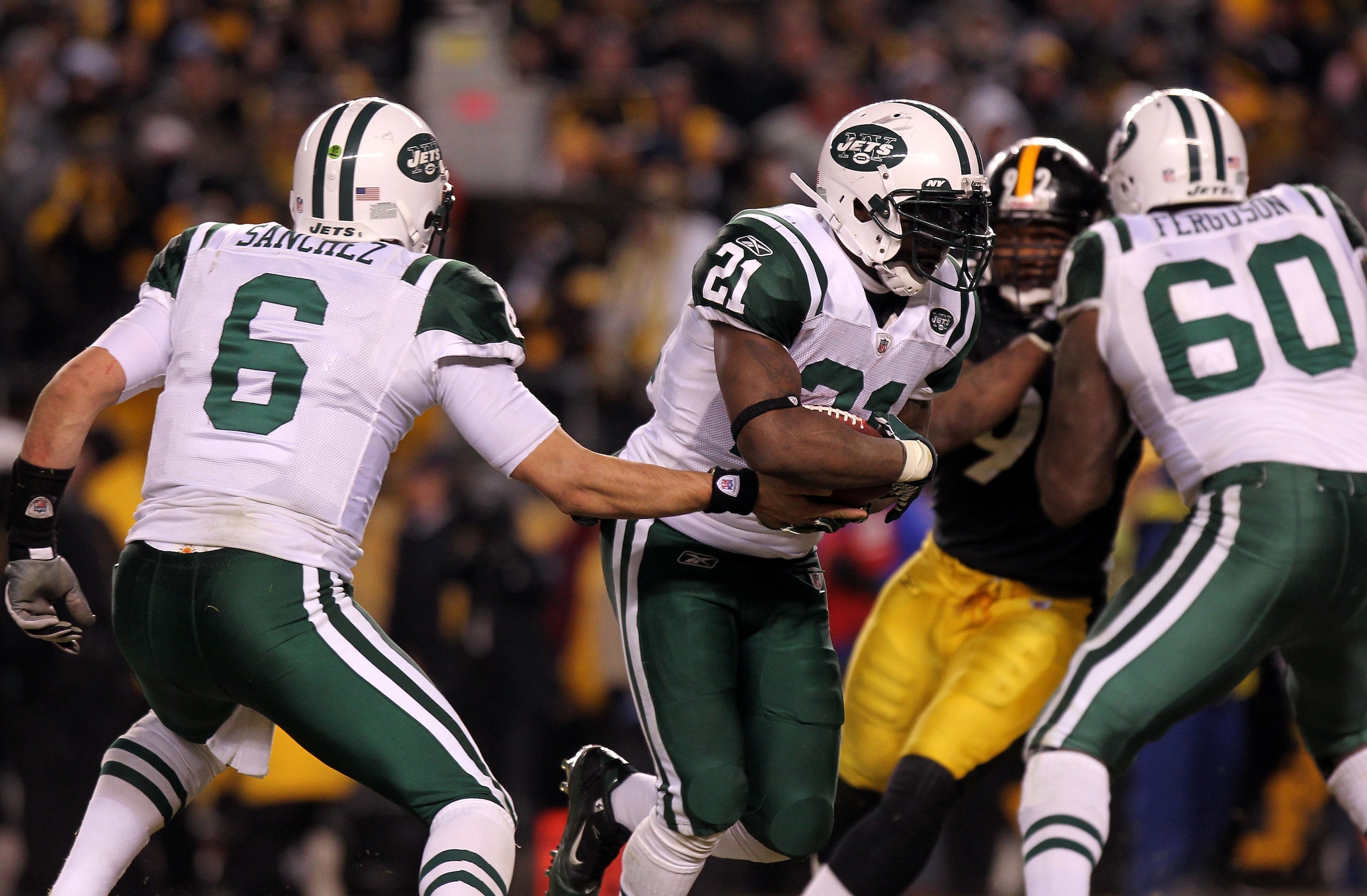 PITTSBURGH, PA - JANUARY 23: Running back LaDainian Tomlinson #21 of the New York Jets takes the hand off from Mark Sanchez #6 against the Pittsburgh Steelers during the 2011 AFC Championship game at Heinz Field on January 23, 2011 in Pittsburgh, Pennsyl PITTSBURGH, PA - JANUARY 23: Running back LaDainian Tomlinson #21 of the New York Jets takes the hand off from Mark Sanchez #6 against the Pittsburgh Steelers during the 2011 AFC Championship game at Heinz Field on January 23, 2011 in Pittsburgh, Pennsyl