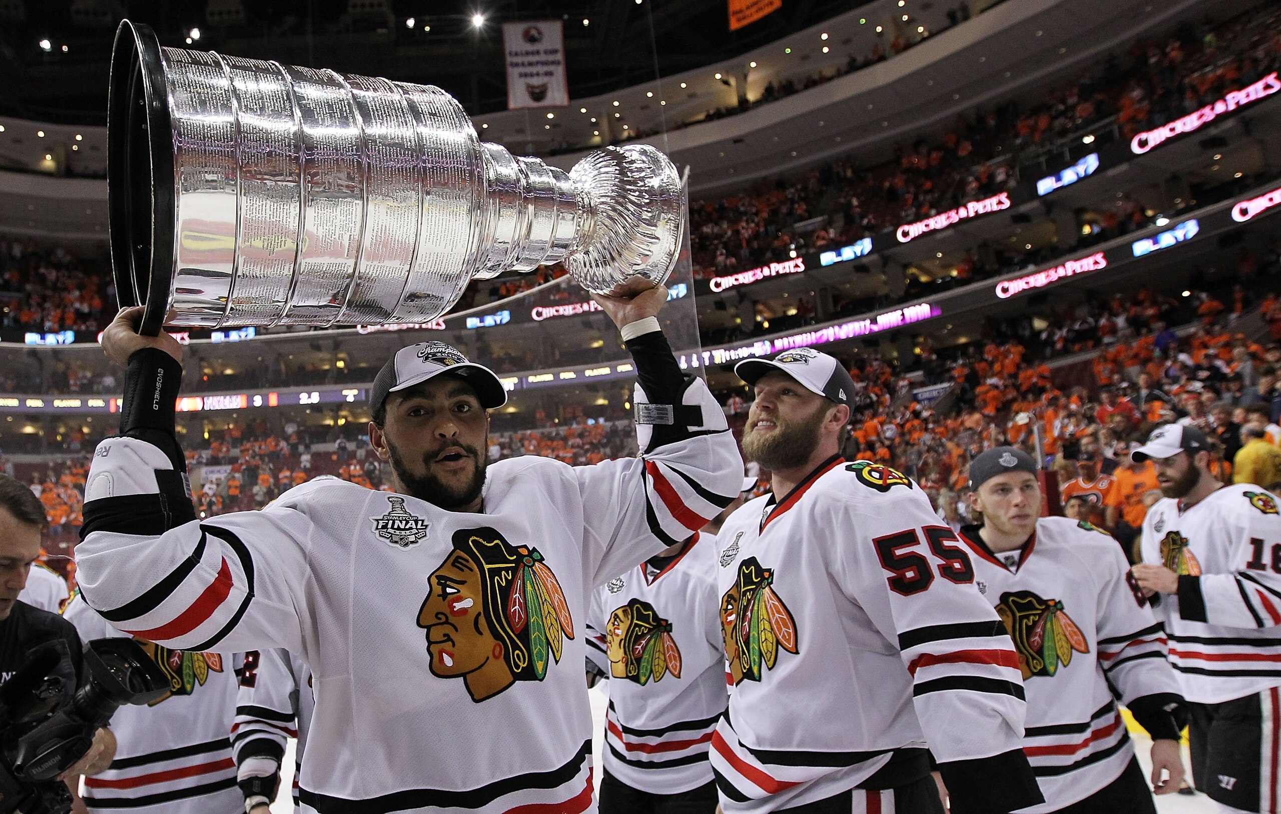 PHILADELPHIA - JUNE 09: Dustin Byfuglien #33 of the Chicago Blackhawks hoists the Stanley Cup after the Blackhawks defeated the Philadelphia Flyers 4-3 in overtime to win the Stanley Cup in Game Six of the 2010 NHL Stanley Cup Final at the Wachovia Center PHILADELPHIA - JUNE 09: Dustin Byfuglien #33 of the Chicago Blackhawks hoists the Stanley Cup after the Blackhawks defeated the Philadelphia Flyers 4-3 in overtime to win the Stanley Cup in Game Six of the 2010 NHL Stanley Cup Final at the Wachovia Center