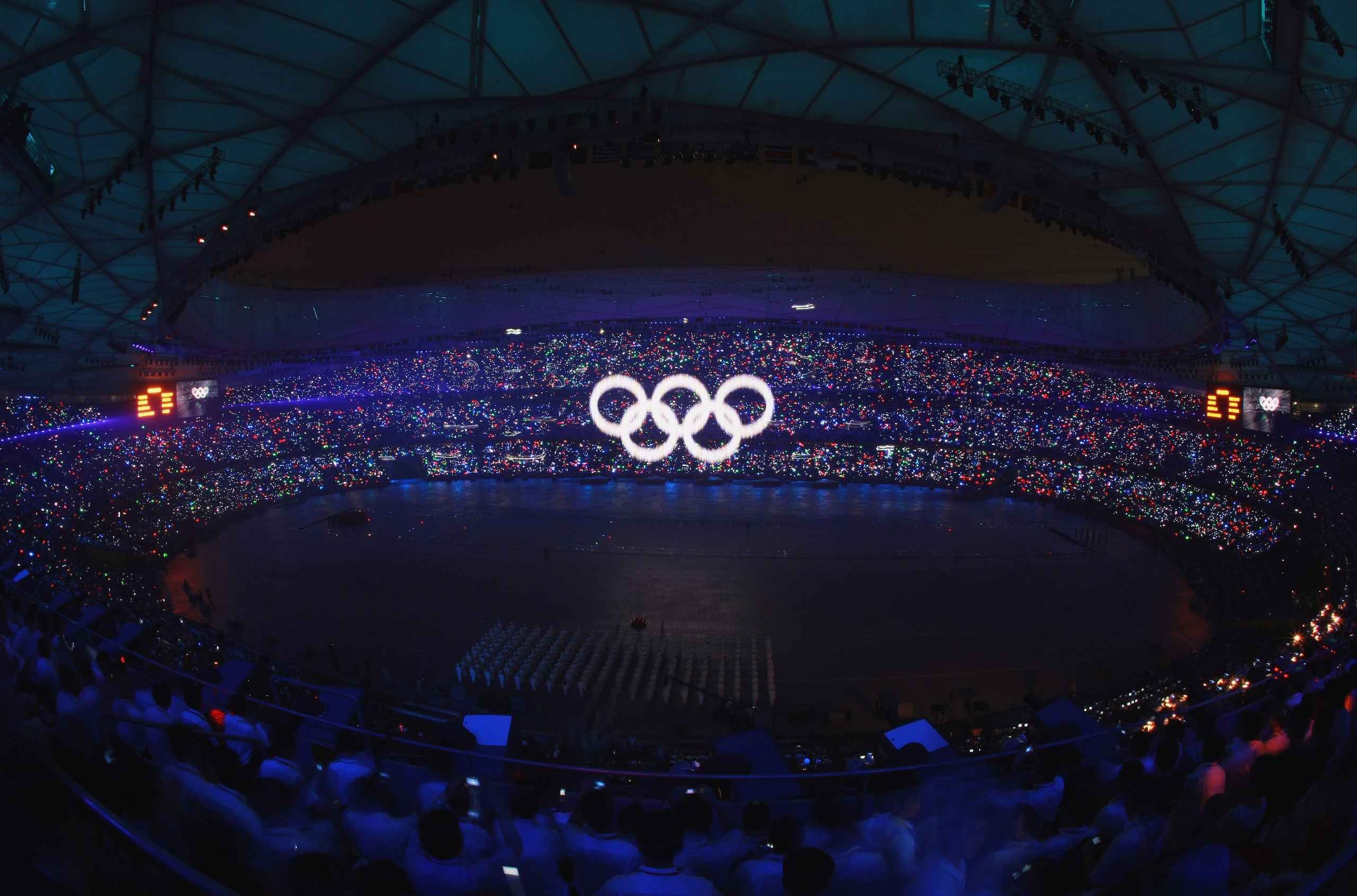 BEIJING - AUGUST 8: The Olympic rings are illuminated during the Opening Ceremony for the 2008 Beijing Summer Olympics at the National Stadium on August 8, 2008 in Beijing, China. (Photo by Adam Pretty/Getty Images) BEIJING - AUGUST 8: The Olympic rings are illuminated during the Opening Ceremony for the 2008 Beijing Summer Olympics at the National Stadium on August 8, 2008 in Beijing, China. (Photo by Adam Pretty/Getty Images)