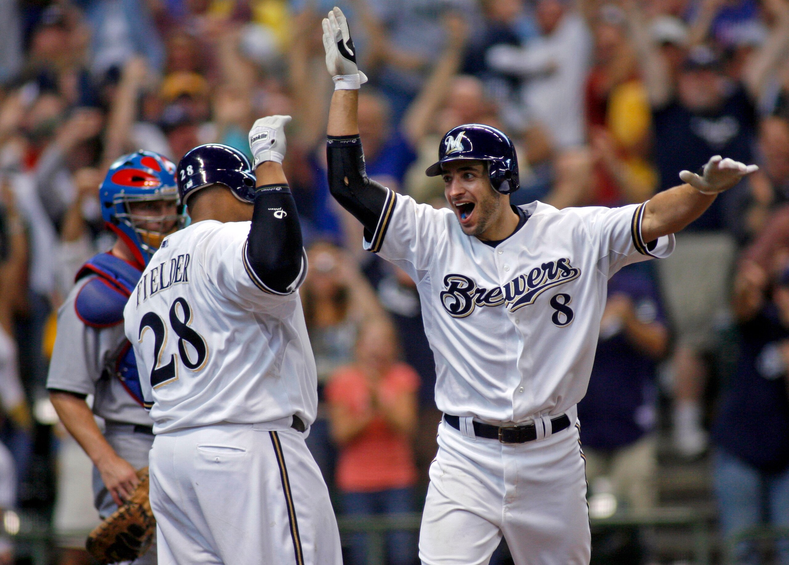 MILWAUKEE - SEPTEMBER 28:  Ryan Braun #8 of the of the Milwaukee Brewers celebrates his game winning two run home run against the Chicago Cubs with teammate Prince Fielder #28 in the eighth inning at Miller Park on September 28, 2008 in Milwaukee, Wiscons