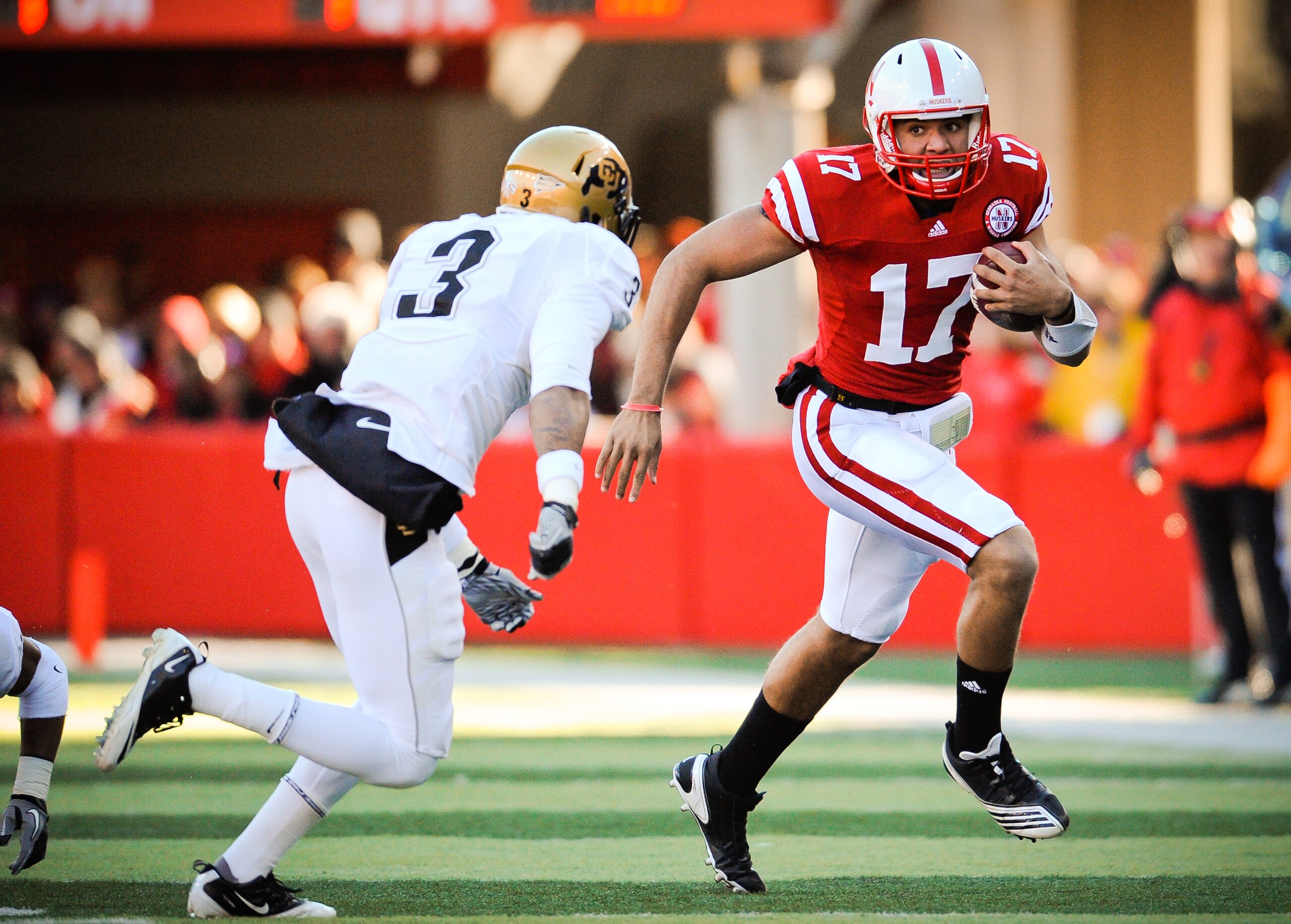 LINCOLN, NE - NOVEMBER 26: Cody Green #17 of the Nebraska Cornhuskers slips past Jimmy Smith #3 of the Colorado Buffaloes during their game at Memorial Stadium on November 26, 2010 in Lincoln, Nebraska. Nebraska defeated Colorado 45-17 (Photo by Eric Fran LINCOLN, NE - NOVEMBER 26: Cody Green #17 of the Nebraska Cornhuskers slips past Jimmy Smith #3 of the Colorado Buffaloes during their game at Memorial Stadium on November 26, 2010 in Lincoln, Nebraska. Nebraska defeated Colorado 45-17 (Photo by Eric Fran