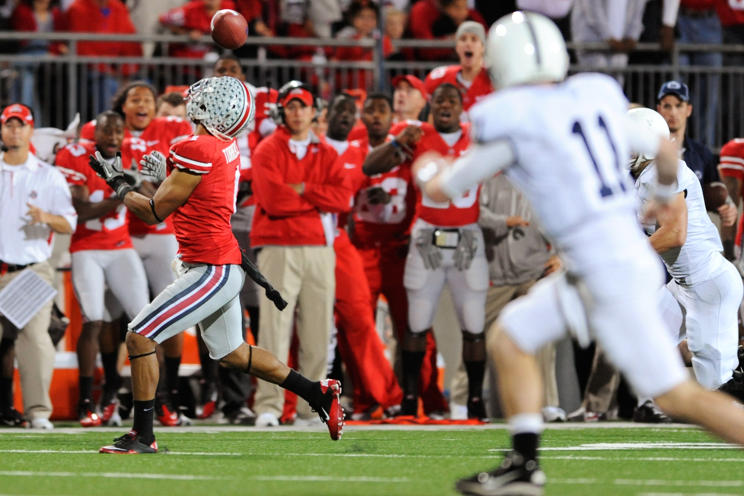 COLUMBUS, OH - NOVEMBER 13:  Devon Torrence #1 of the Ohio State Buckeyes intercepts a pass in the third quarter against the Penn State Nittany Lions at Ohio Stadium on November 13, 2010 in Columbus, Ohio. Torrence returned the interception 34-yards for a