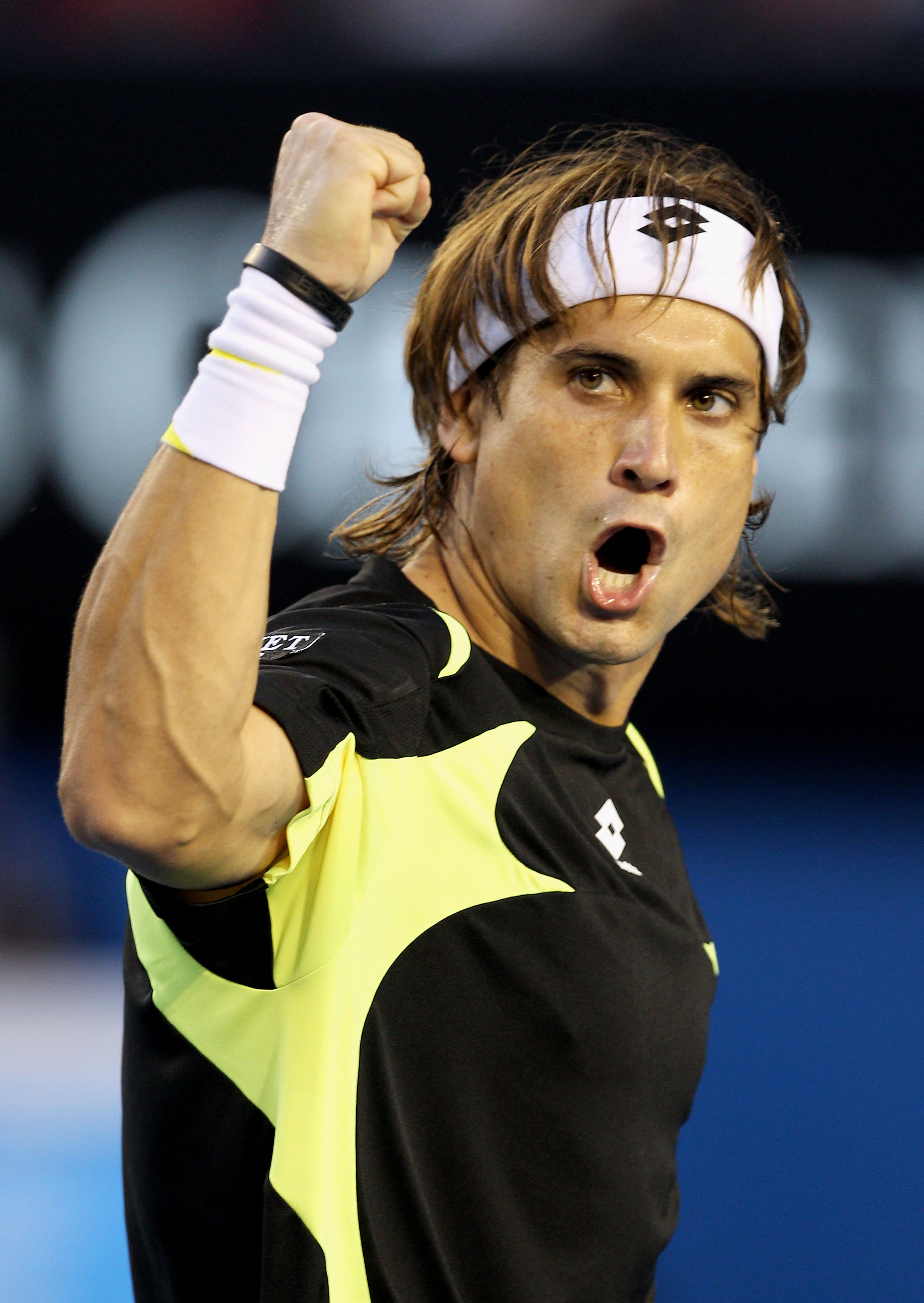 MELBOURNE, AUSTRALIA - JANUARY 28:  David Ferrer of Spain celebrates winninga point in his semifinal match against Andy Murray of Great Britain during day twelve of the 2011 Australian Open at Melbourne Park on January 28, 2011 in Melbourne, Australia.  (