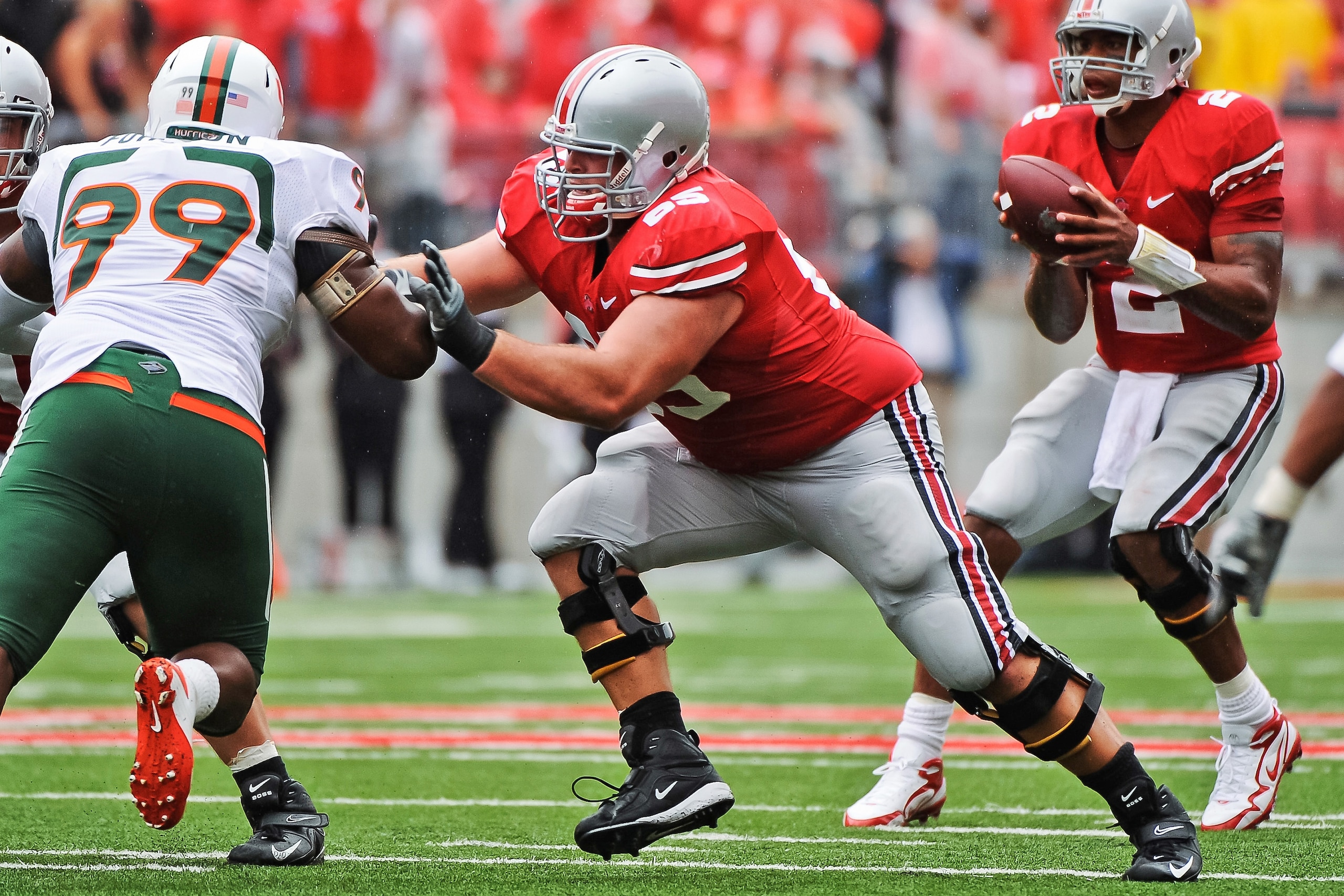 COLUMBUS, OH - SEPTEMBER 11:  Justin Boren #65 of the Ohio State Buckeyes blocks against the Miami Hurricanes at Ohio Stadium on September 11, 2010 in Columbus, Ohio.  (Photo by Jamie Sabau/Getty Images)