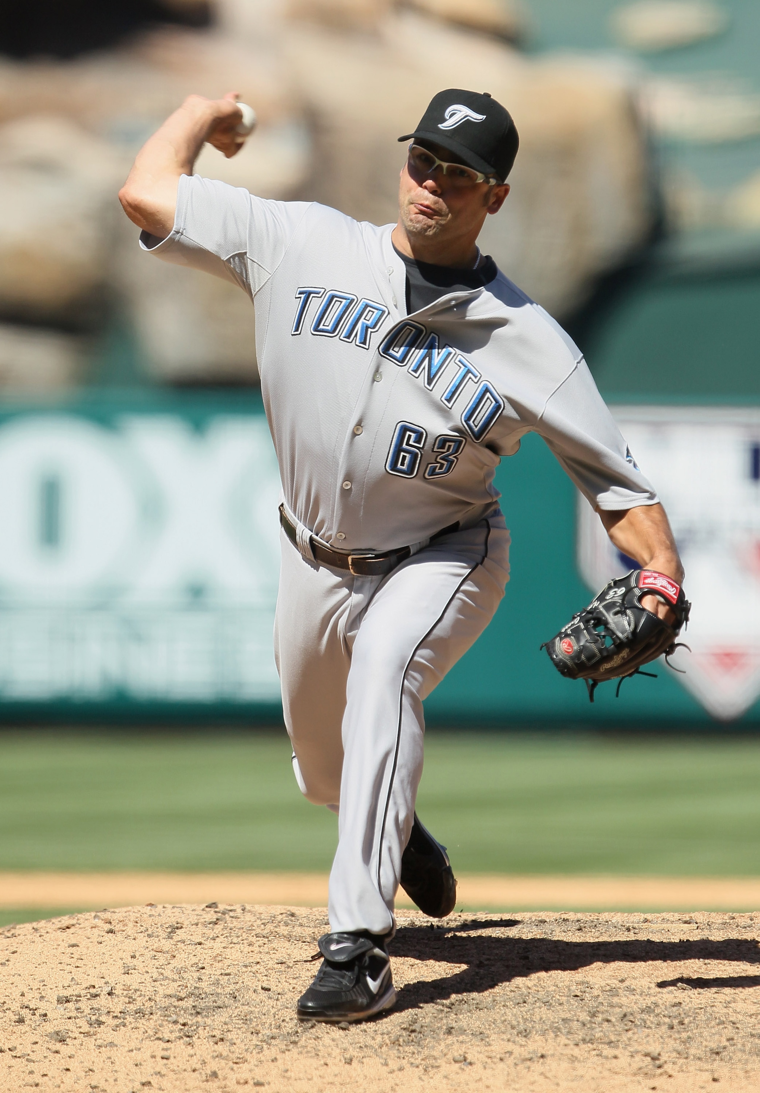 ANAHEIM, CA - AUGUST 15:  Kevin Gregg #63 of the Toronto Blue Jays pitches against the Los Angeles Angels of Anaheim in the ninth inning at Angel Stadium on August 15, 2010 in Anaheim, California. The Blue Jays defeated the Angels 4-1.  (Photo by Jeff Gro
