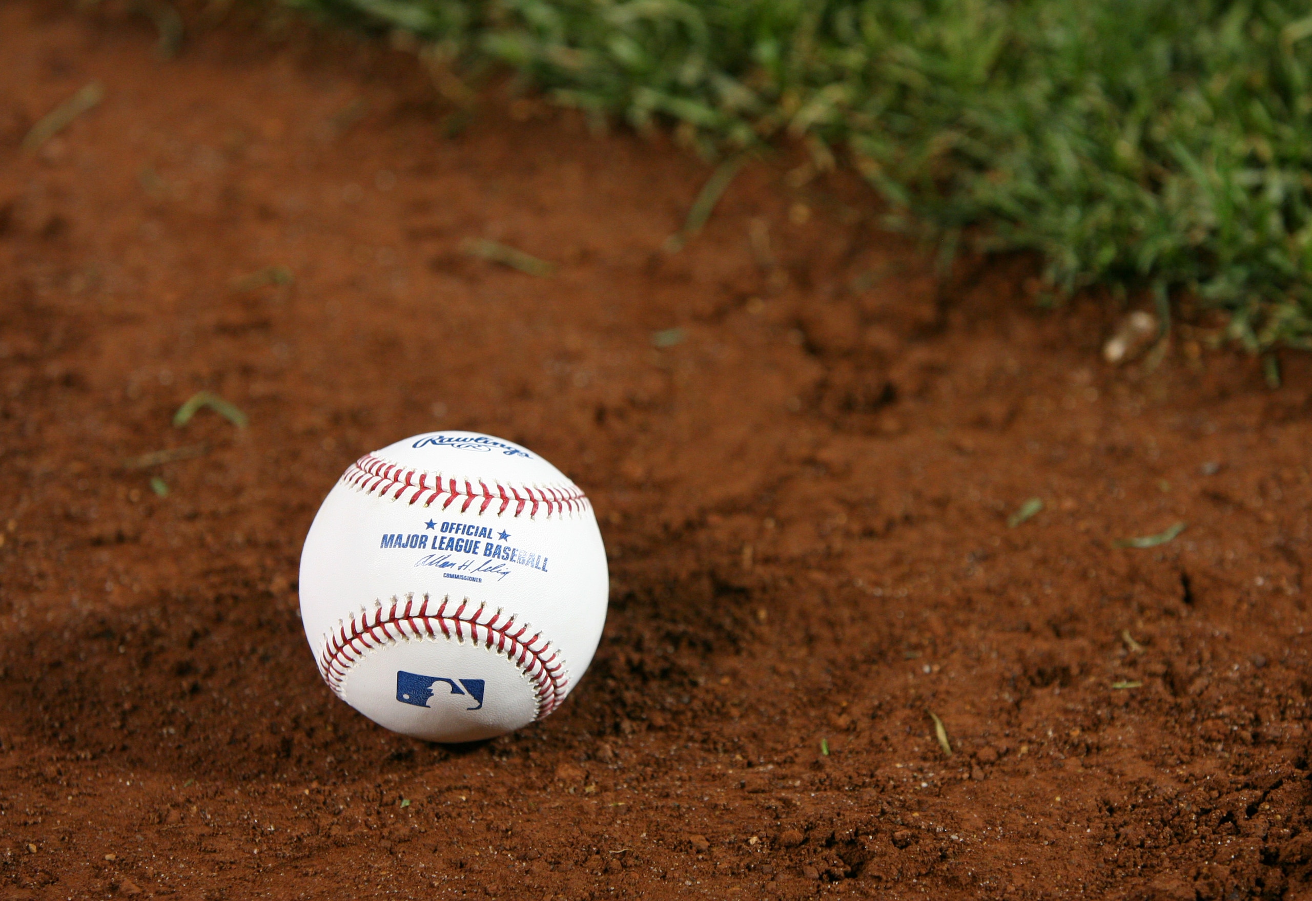PHILADELPHIA - SEPTEMBER 25: A baseball sits on the infield dirt after a game between the Philadelphia Phillies and the New York Mets at Citizens Bank Park on September 25, 2010 in Philadelphia, Pennsylvania. The Mets won 5-2. (Photo by Hunter Martin/Gett