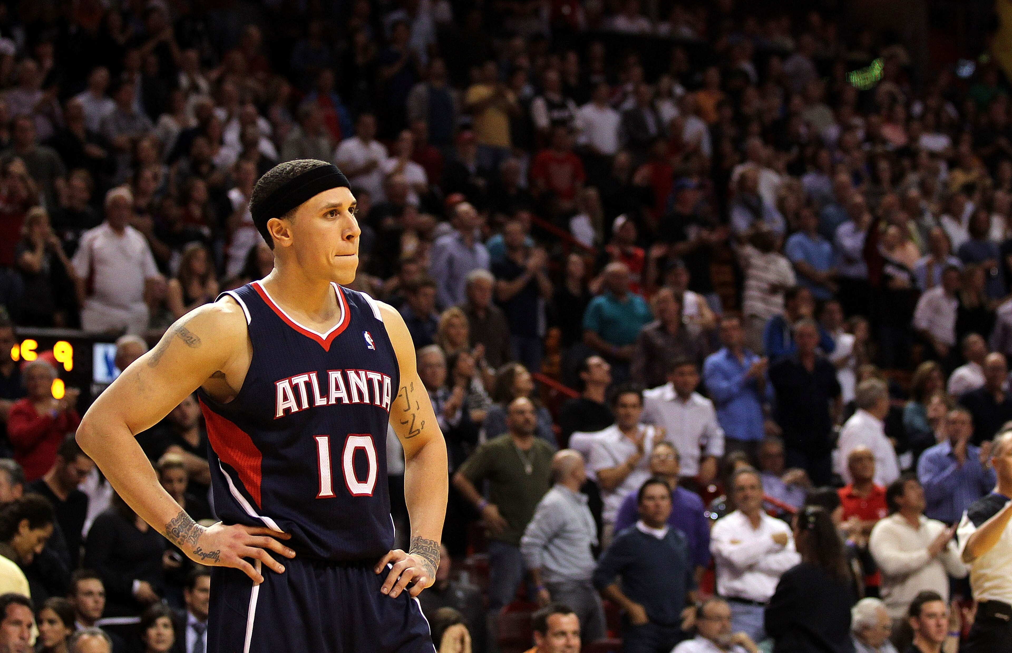 MIAMI, FL - JANUARY 18: Mike Bibby #10 of the Atlanta Hawks looks on during a game against the Miami Heat at American Airlines Arena on January 18, 2011 in Miami, Florida. NOTE TO USER: User expressly acknowledges and agrees that, by downloading and/or u MIAMI, FL - JANUARY 18: Mike Bibby #10 of the Atlanta Hawks looks on during a game against the Miami Heat at American Airlines Arena on January 18, 2011 in Miami, Florida. NOTE TO USER: User expressly acknowledges and agrees that, by downloading and/or u