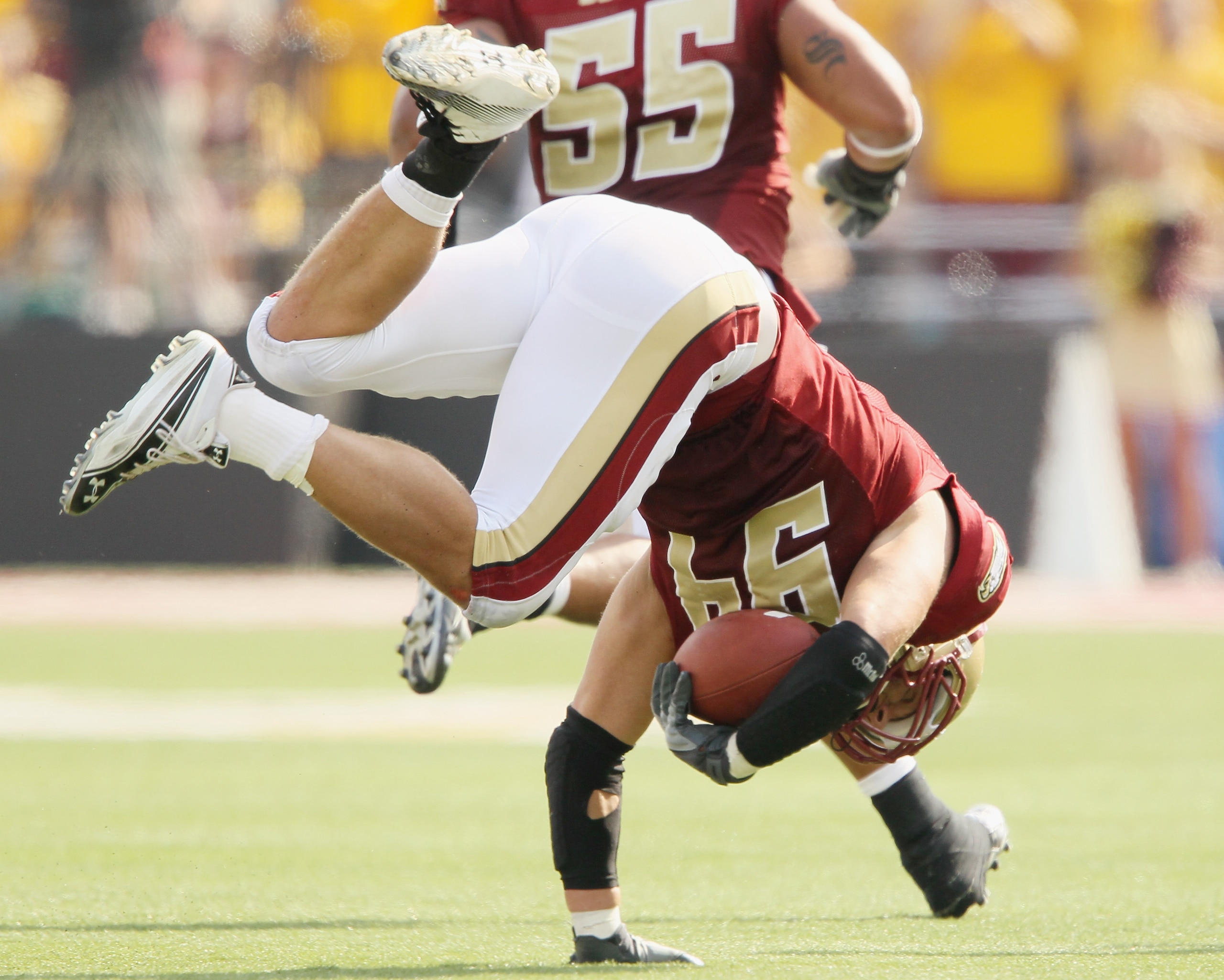 CHESTNUT HILL, MA - SEPTEMBER 25:  Mark Herzlich #94 of the Boston College Eagles falls after he intercepts a pass from Tyrod Taylor of the Virginia Tech Hokies on September 25, 2010 at Alumni Stadium in Chestnut Hill, Massachusetts. Virginia Tech defeate
