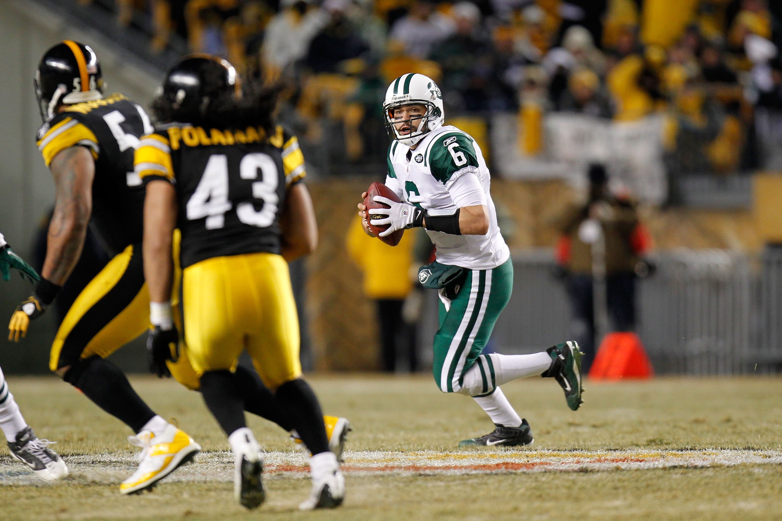 PITTSBURGH, PA - JANUARY 23:  Mark Sanchez #6 of the New York Jets drops back during their 19 to 24 loss to the Pittsburgh Steelers in the 2011 AFC Championship game at Heinz Field on January 23, 2011 in Pittsburgh, Pennsylvania.  (Photo by Gregory Shamus