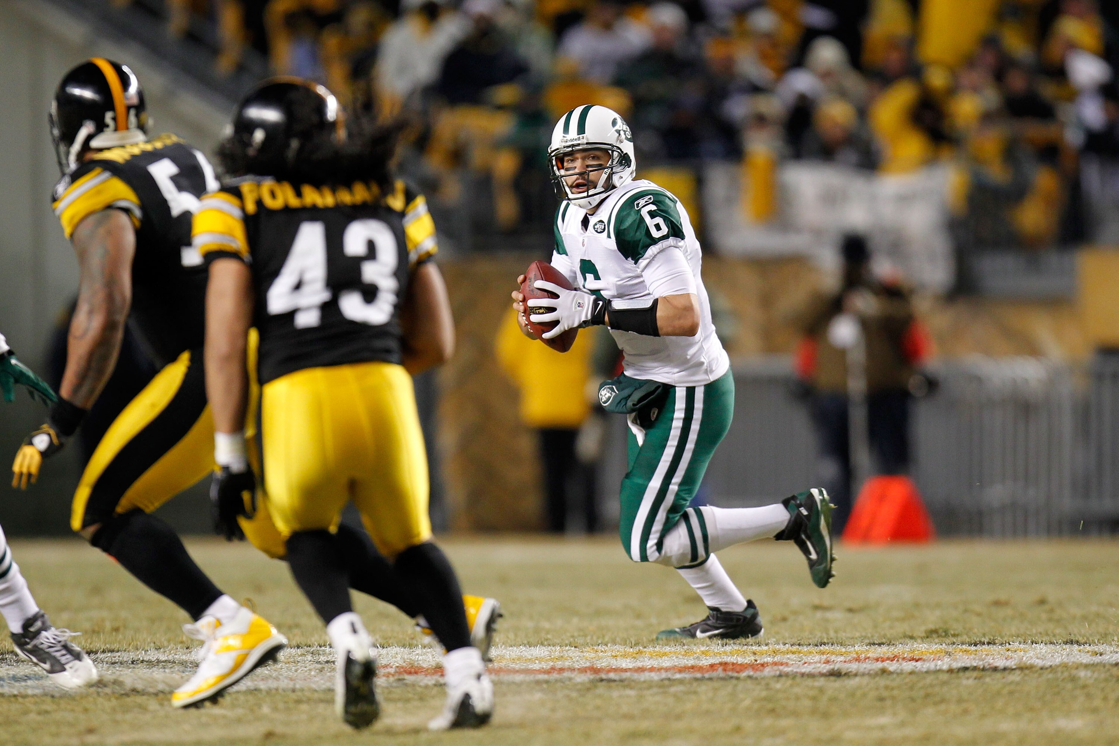 PITTSBURGH, PA - JANUARY 23: Mark Sanchez #6 of the New York Jets drops back during their 19 to 24 loss to the Pittsburgh Steelers in the 2011 AFC Championship game at Heinz Field on January 23, 2011 in Pittsburgh, Pennsylvania. (Photo by Gregory Shamus PITTSBURGH, PA - JANUARY 23: Mark Sanchez #6 of the New York Jets drops back during their 19 to 24 loss to the Pittsburgh Steelers in the 2011 AFC Championship game at Heinz Field on January 23, 2011 in Pittsburgh, Pennsylvania. (Photo by Gregory Shamus