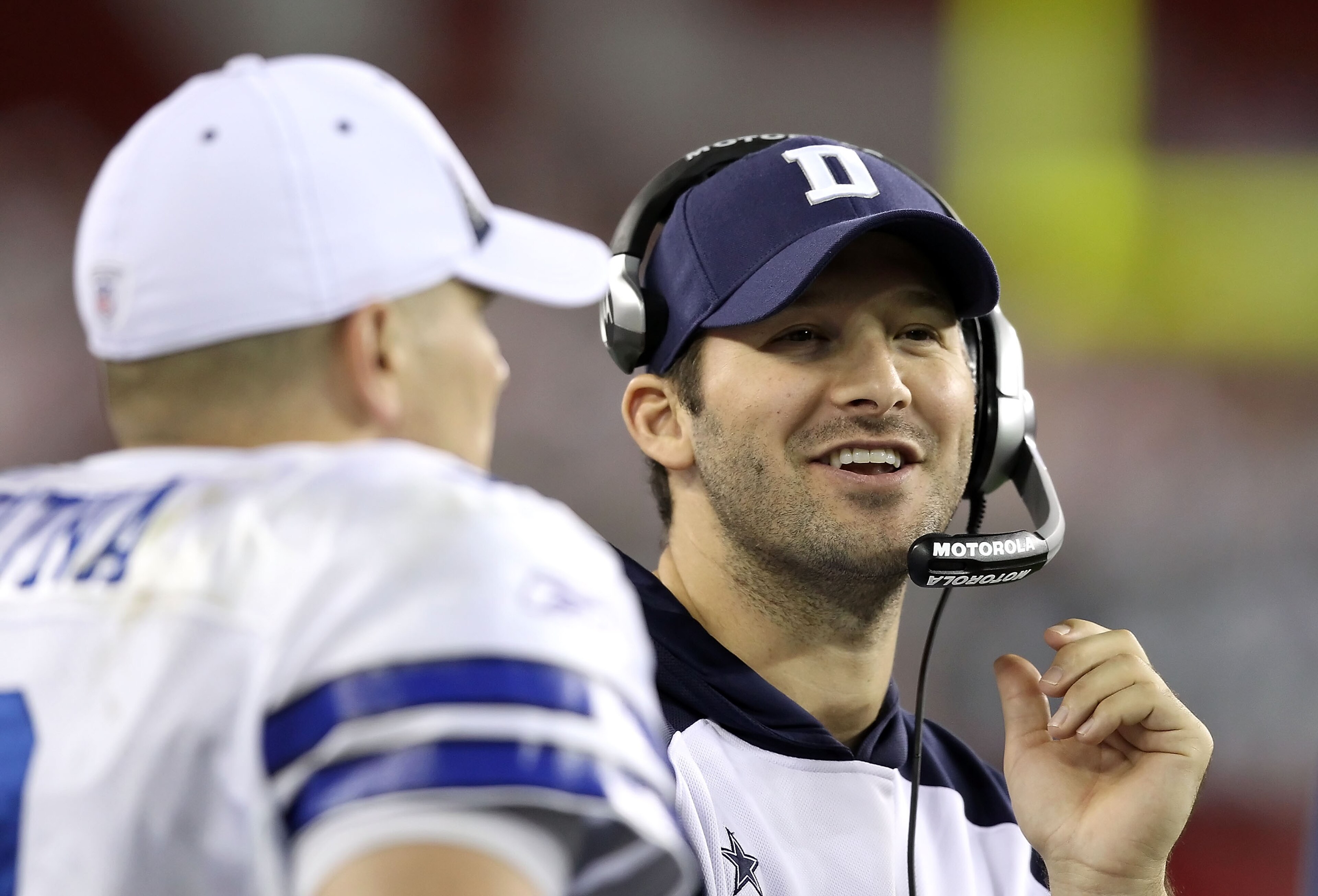 GLENDALE, AZ - DECEMBER 25: Quarterbacks Tony Romo and Jon Kitna #3 of the Dallas Cowboys talk on the sideline during the NFL game against the Arizona Cardinals at the University of Phoenix Stadium on December 25, 2010 in Glendale, Arizona. The Cardinals GLENDALE, AZ - DECEMBER 25: Quarterbacks Tony Romo and Jon Kitna #3 of the Dallas Cowboys talk on the sideline during the NFL game against the Arizona Cardinals at the University of Phoenix Stadium on December 25, 2010 in Glendale, Arizona. The Cardinals
