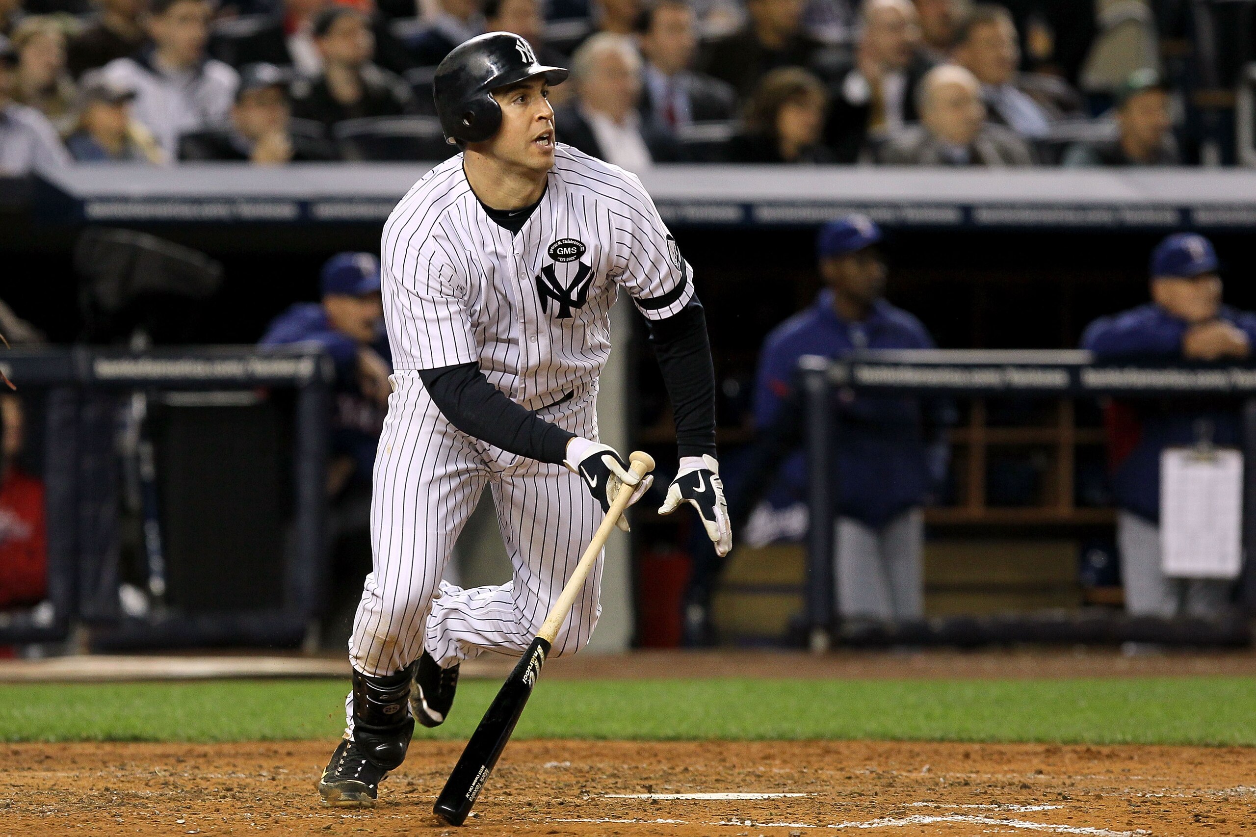 NEW YORK - OCTOBER 19:  Mark Teixeira #25 of the New York Yankees bats against the Texas Rangers in Game Four of the ALCS during the 2010 MLB Playoffs at Yankee Stadium on October 19, 2010 in the Bronx borough of New York City. The Rangers won 10-3.  (Pho