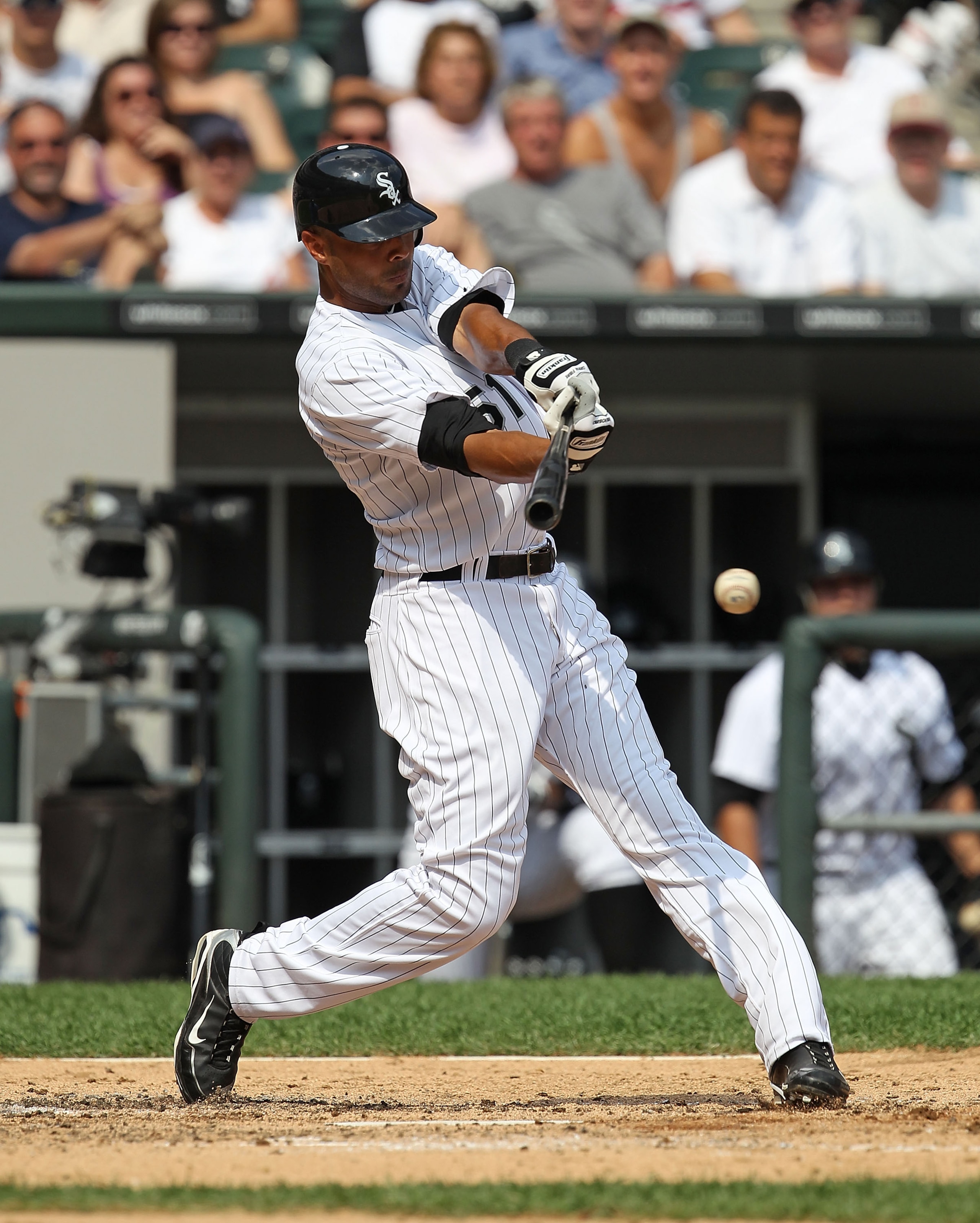 CHICAGO - AUGUST 29: Alex Rios #51 of the Chicago White Sox hits the ball against the New York Yankees at U.S. Cellular Field on August 29, 2010 in Chicago, Illinois. The Yankees defeated the White Sox 2-1. (Photo by Jonathan Daniel/Getty Images)