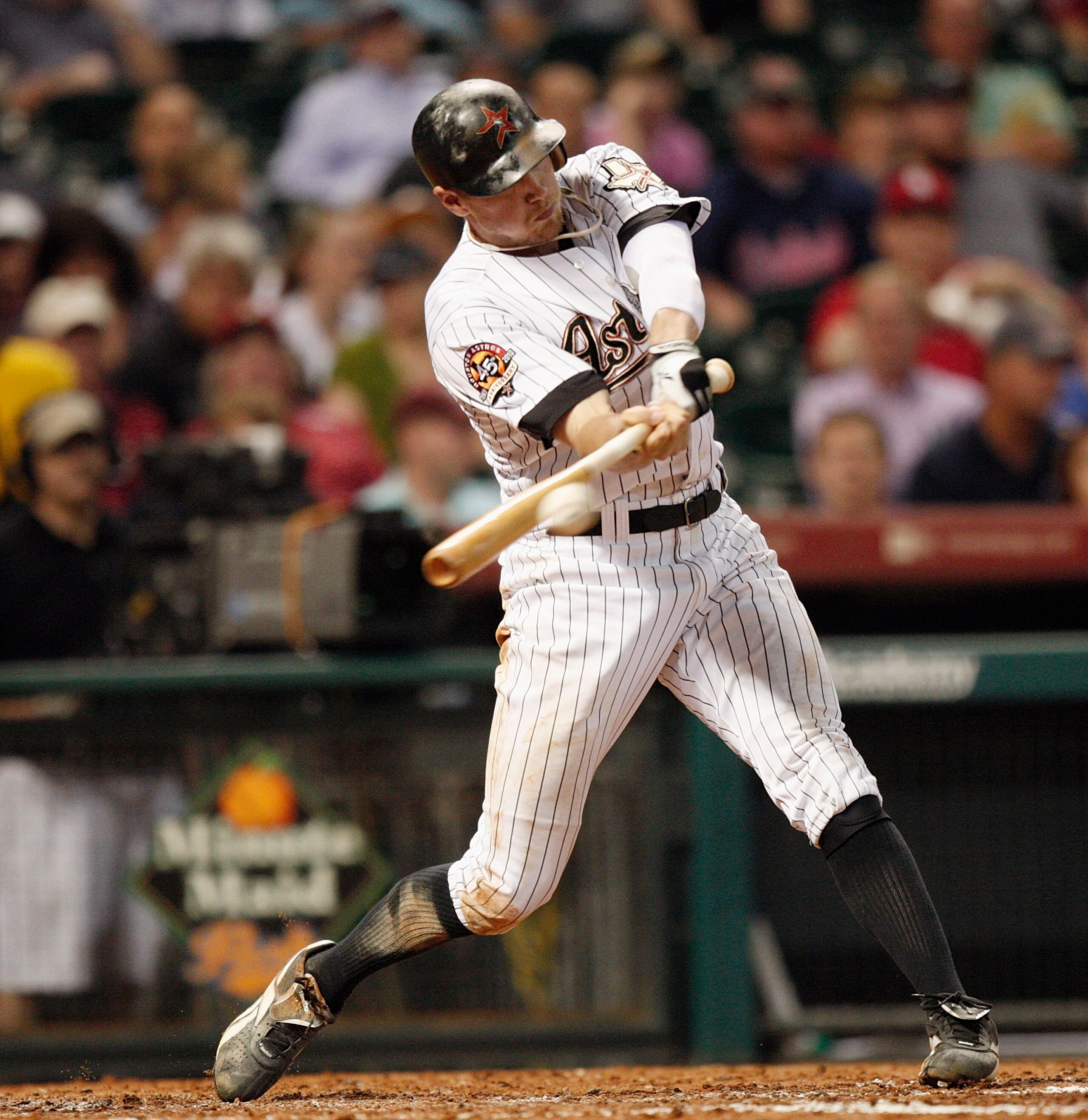 HOUSTON - AUGUST 30:  Hunter Pence #9 of the Houston Astros drives the ball up the middle against the St. Louis Cardinlas at Minute Maid Park on August 30, 2010 in Houston, Texas. The Astros beat the Cardinals 3-0.  (Photo by Bob Levey/Getty Images)