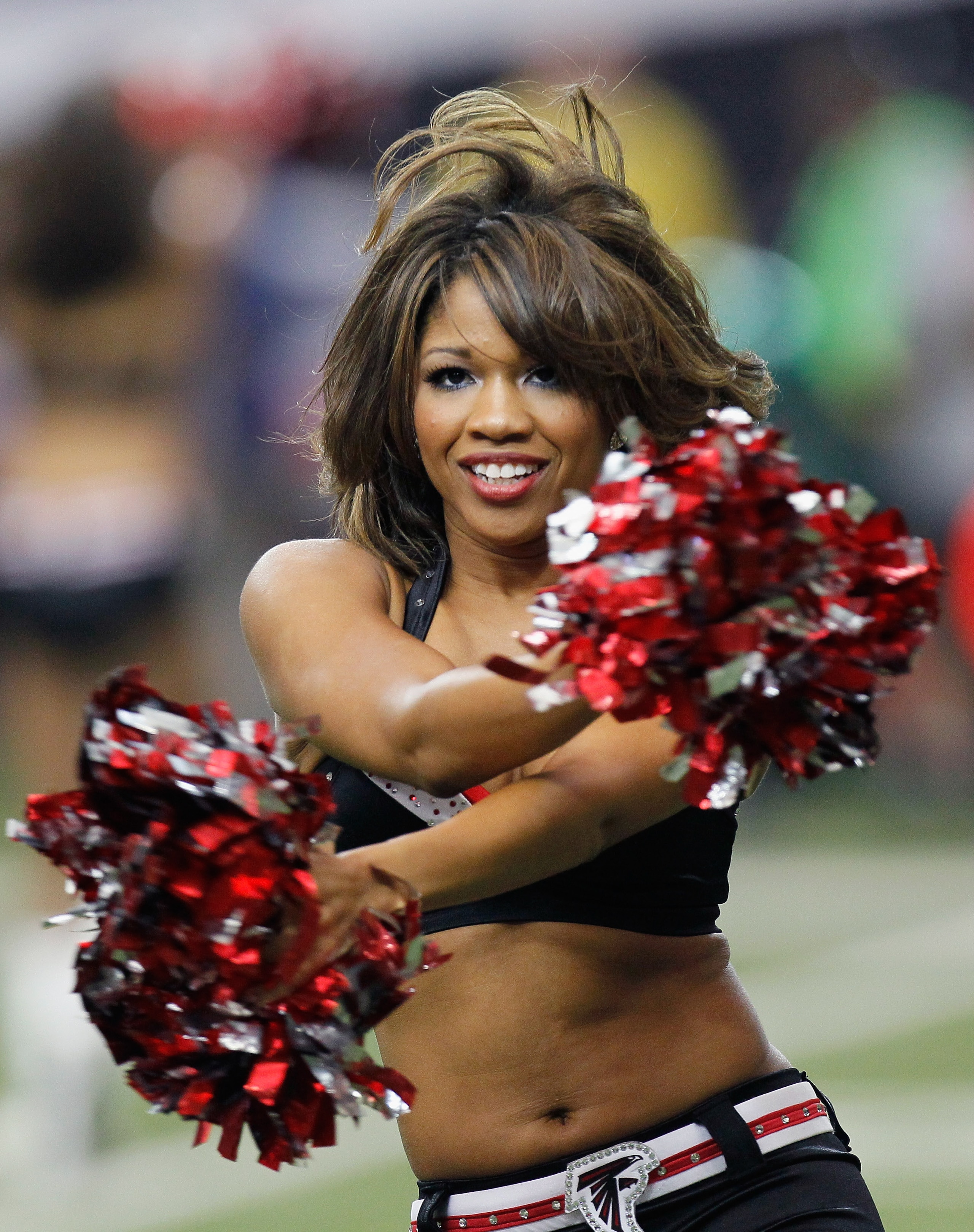 ATLANTA, GA - JANUARY 02:  An Atlanta Falcons cheerleader performs against the Carolina Panthers at Georgia Dome on January 2, 2011 in Atlanta, Georgia.  (Photo by Kevin C. Cox/Getty Images)