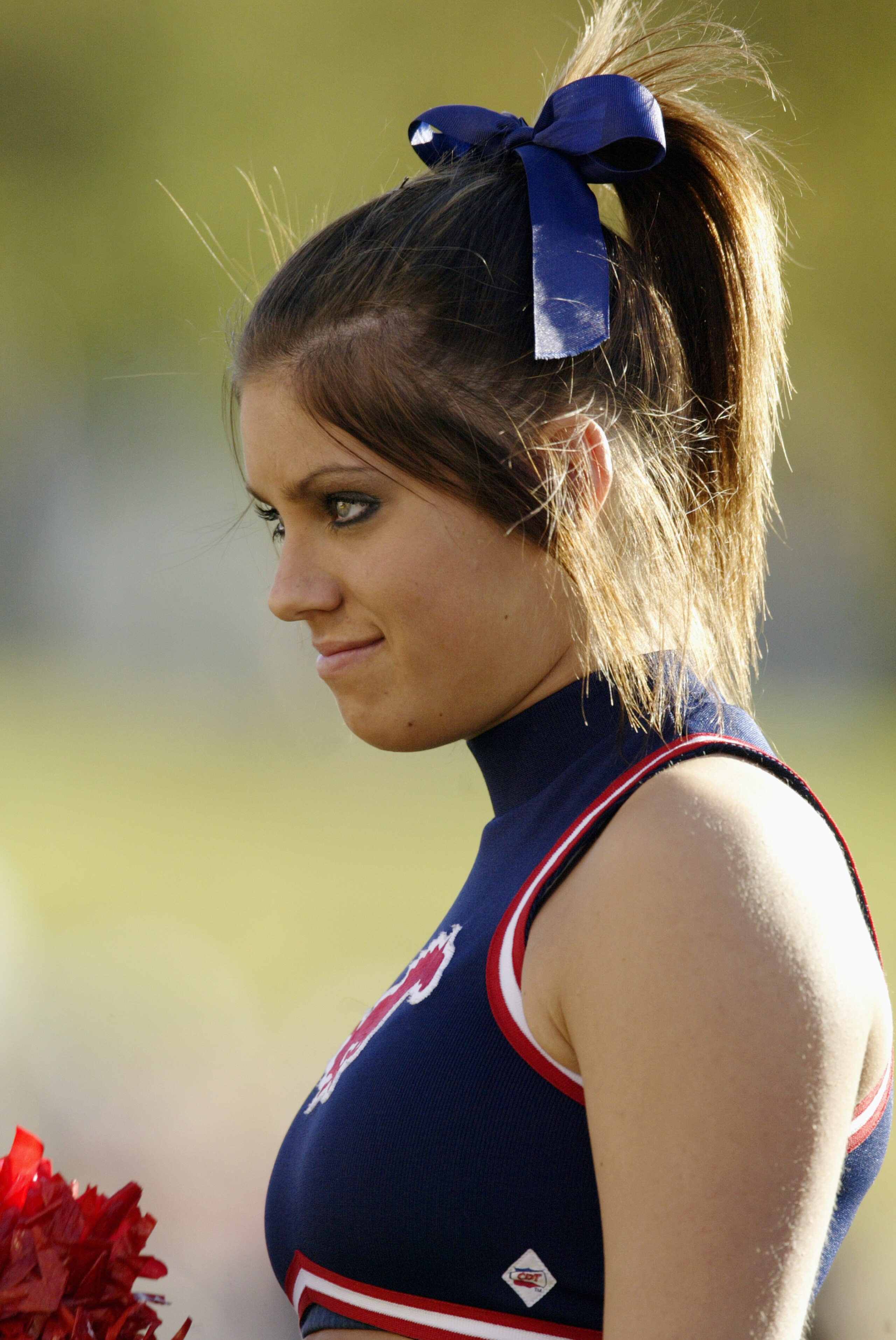DALLAS - NOVEMBER 29:  A Southern Methodist University Mustangs cheerleader during the game against the Texas Christian University Horned Frogs on November 29, 2003 at Gerald J. Ford Stadium in Dallas, Texas. TCU won 20-13.  (Photo by Brian Bahr/Getty Ima