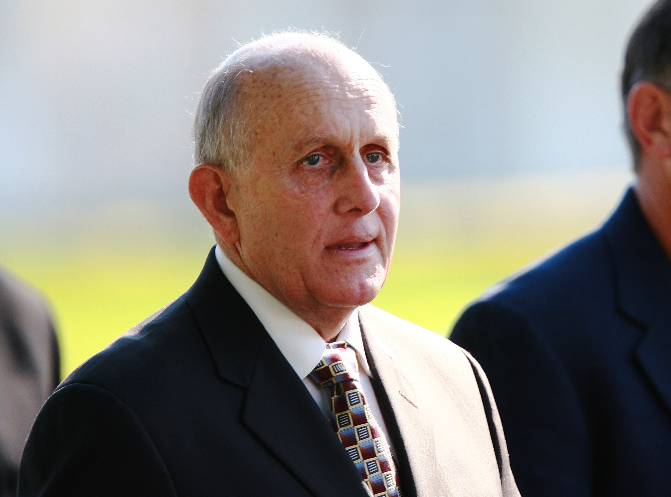 MIAMI - DECEMBER 03:  Former Miami Hurricanes head coach Larry Coker arrives at funeral services for Sean Taylor of the Washington Redskins at Pharmed Arena on December 3, 2007 in Miami, Florida. Taylor died November 27, one day after being shot at his ho