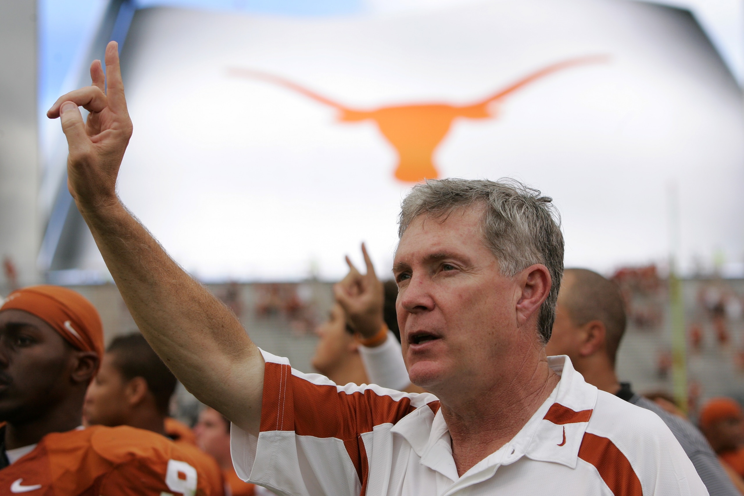 AUSTIN, TX - SEPTEMBER 29:  Head coach Mack Brown of the Texas Longhorns sings 'The Eyes of Texas' after a loss to the Kansas State Wildcats on September 29, 2007 at Darrell K Royal-Texas Memorial Stadium in Austin, Texas.  Kansas State won 41-21. (Photo