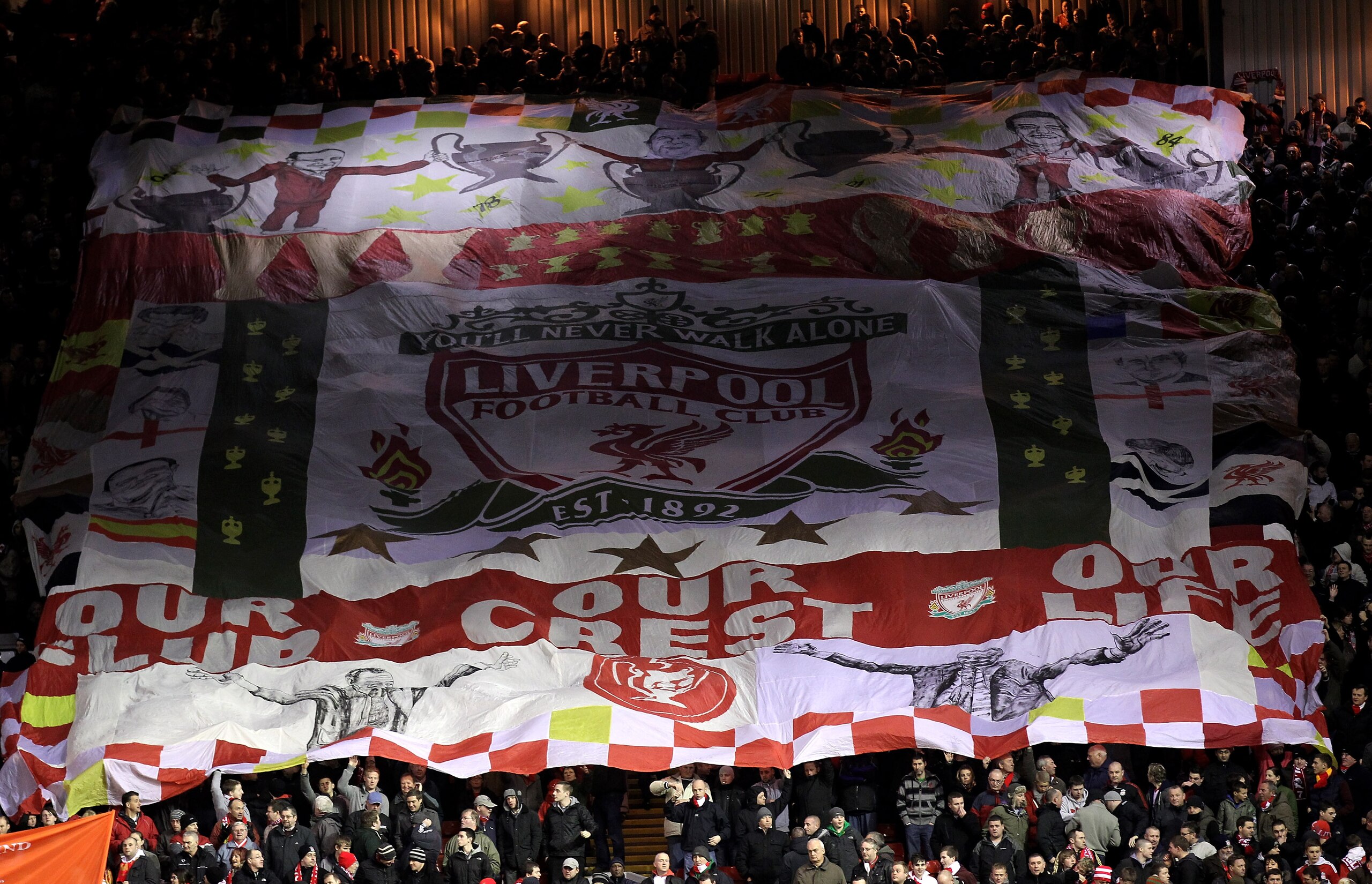 LIVERPOOL, ENGLAND - JANUARY 26:  Liverpool fans display a giant banner on the Kop prior to the Barclays Premier League match between Liverpool and Fulham at Anfield on January 26, 2011 in Liverpool, England. (Photo by Alex Livesey/Getty Images)