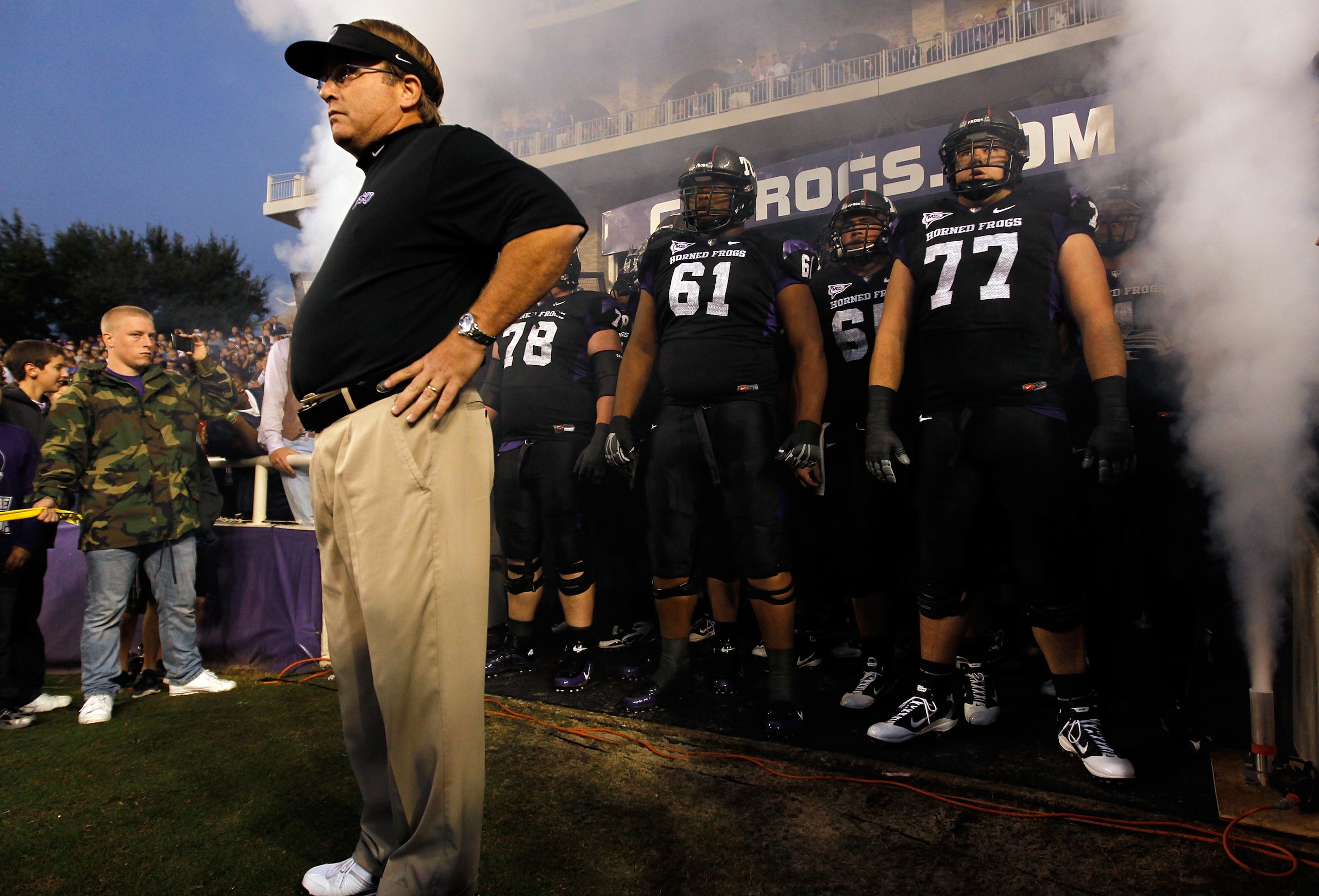 FORT WORTH, TX - OCTOBER 23:  Head coach Gary Patterson of the TCU Horned Frogs leads his team on the field against the Air Force Falcons at Amon G. Carter Stadium on October 23, 2010 in Fort Worth, Texas.  TCU beat Air Force 38-7. (Photo by Tom Penningto