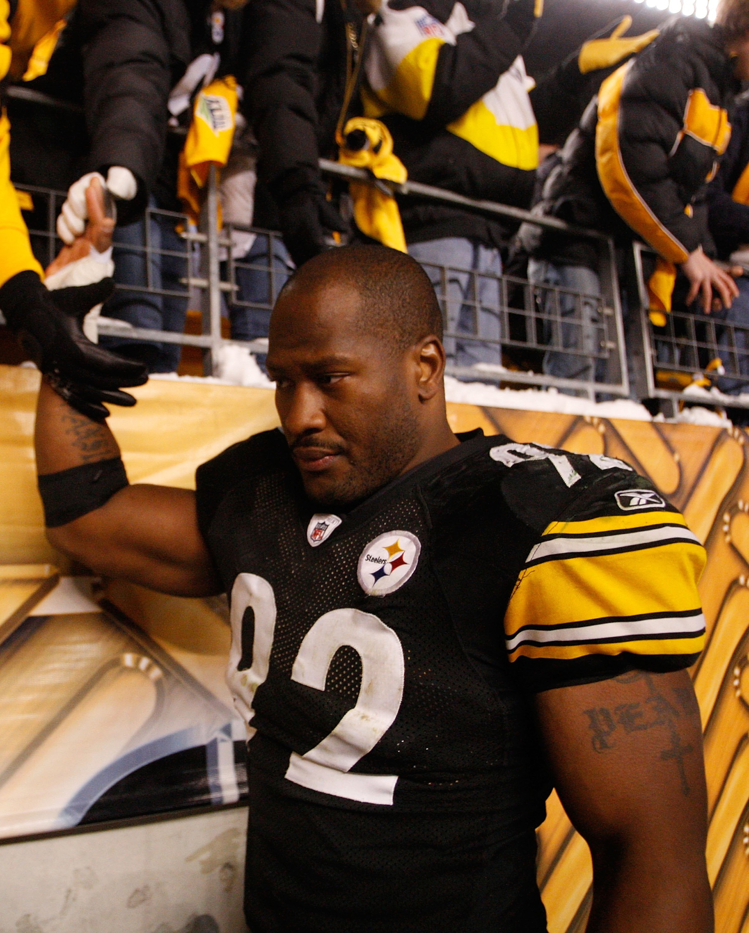 PITTSBURGH - DECEMBER 20: James Harrison #92 of the Pittsburgh Steelers high fives fans as he walks off the field following the game against the Green Bay Packers on December 20, 2009 at Heinz Field in Pittsburgh, Pennsylvania. (Photo by Jared Wickerham PITTSBURGH - DECEMBER 20: James Harrison #92 of the Pittsburgh Steelers high fives fans as he walks off the field following the game against the Green Bay Packers on December 20, 2009 at Heinz Field in Pittsburgh, Pennsylvania. (Photo by Jared Wickerham