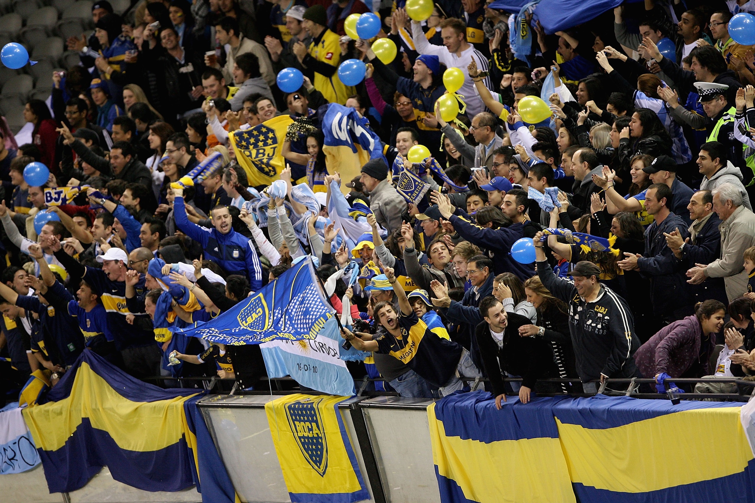 MELBOURNE, AUSTRALIA - JULY 16:  Boca Juniors fans celebrate during the pre-season International Friendly between Melbourne Victory and Argentina's Boca Juniors at Etihad Stadium on July 16, 2010 in Melbourne, Australia.  (Photo by Robert Prezioso/Getty I