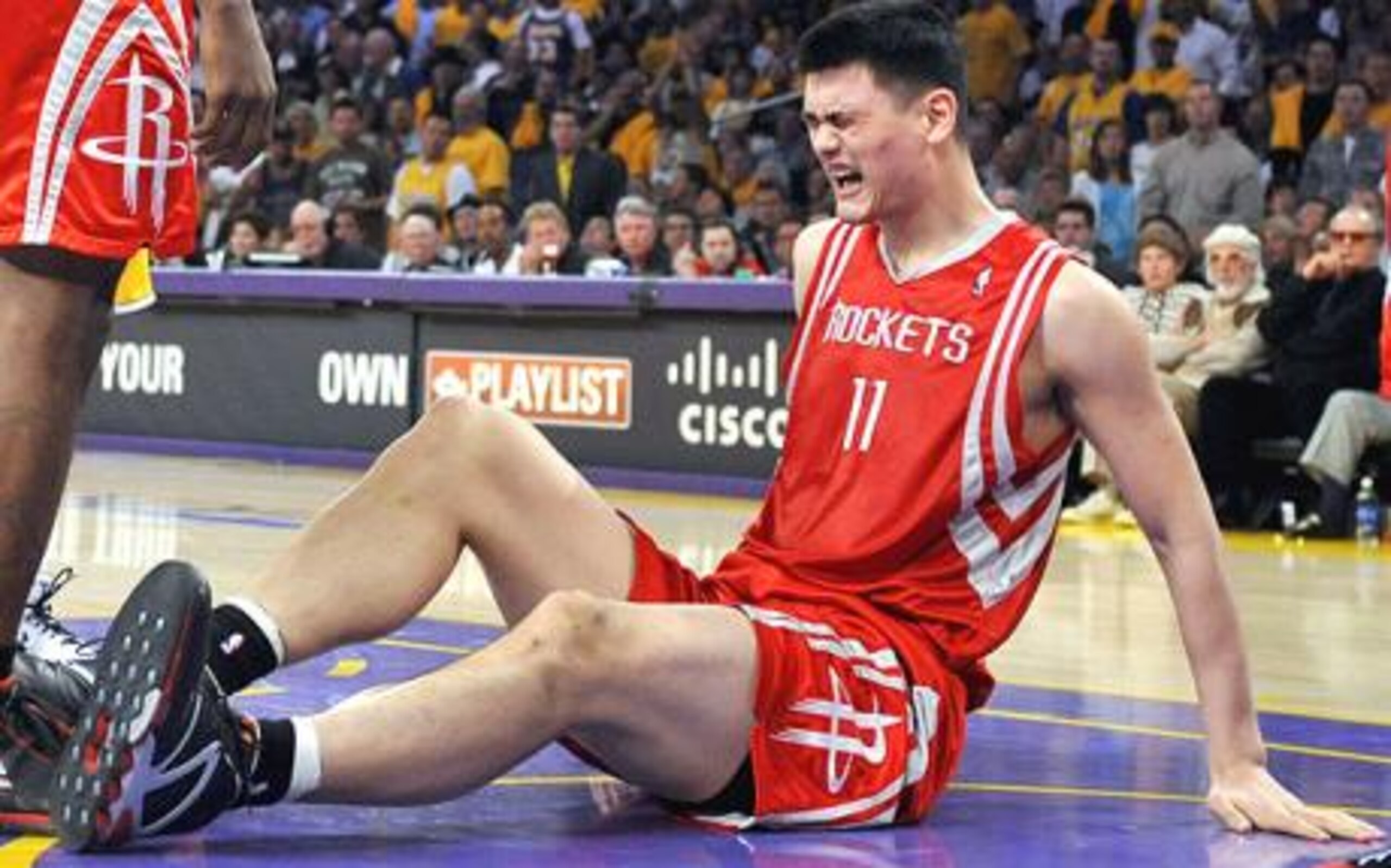 YAO Ming in Pain over the LA Lakers hardwood and set stage for the 2011 ALL Star game.