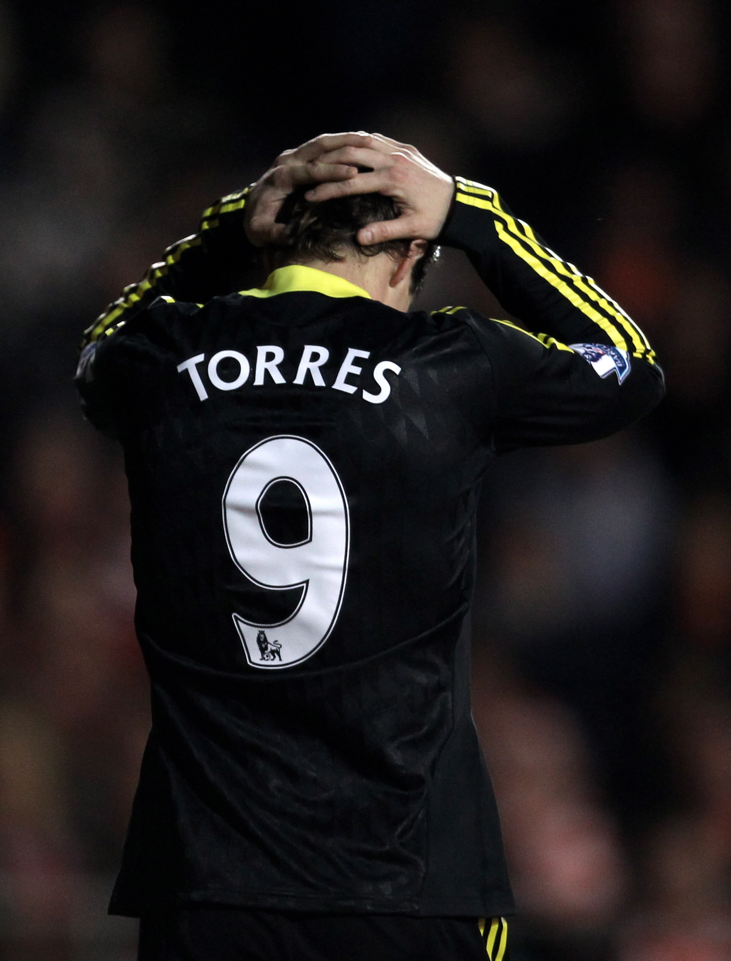 BLACKPOOL, ENGLAND - JANUARY 12:  Fernando Torres of Liverpool reacts to a missed chance during the Barclays Premier League match between Blackpool and Liverpool at Bloomfield Road on January 12, 2011 in Blackpool, England.  (Photo by Alex Livesey/Getty I