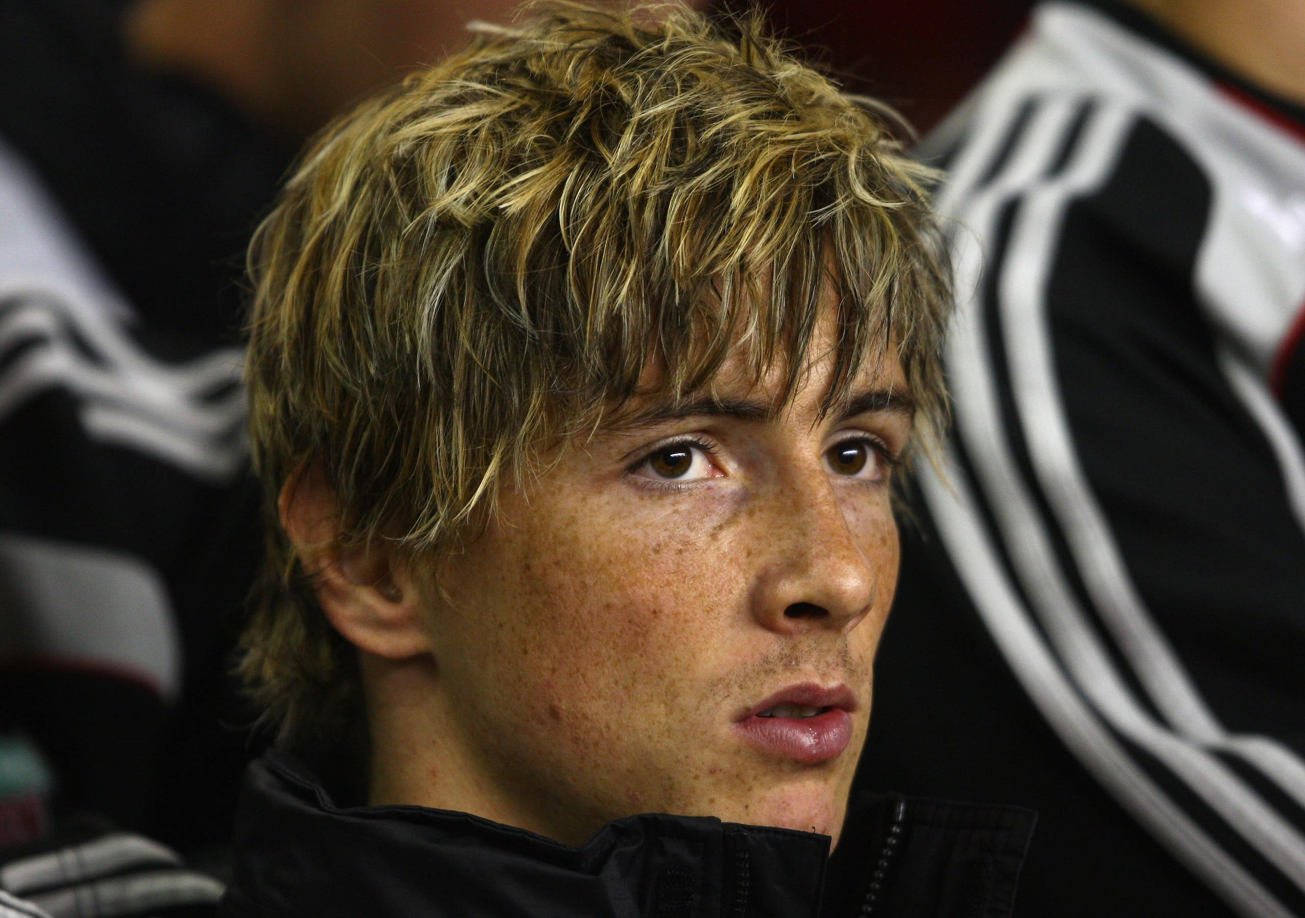 LIVERPOOL, UNITED KINGDOM - SEPTEMBER 23:  Fernando Torres of Liverpool looks on from the bench prior to the Carling Cup Third Round match between Liverpool and Crewe Alexandra at Anfield on September 23, 2008 in Liverpool, England.  (Photo by Clive Bruns
