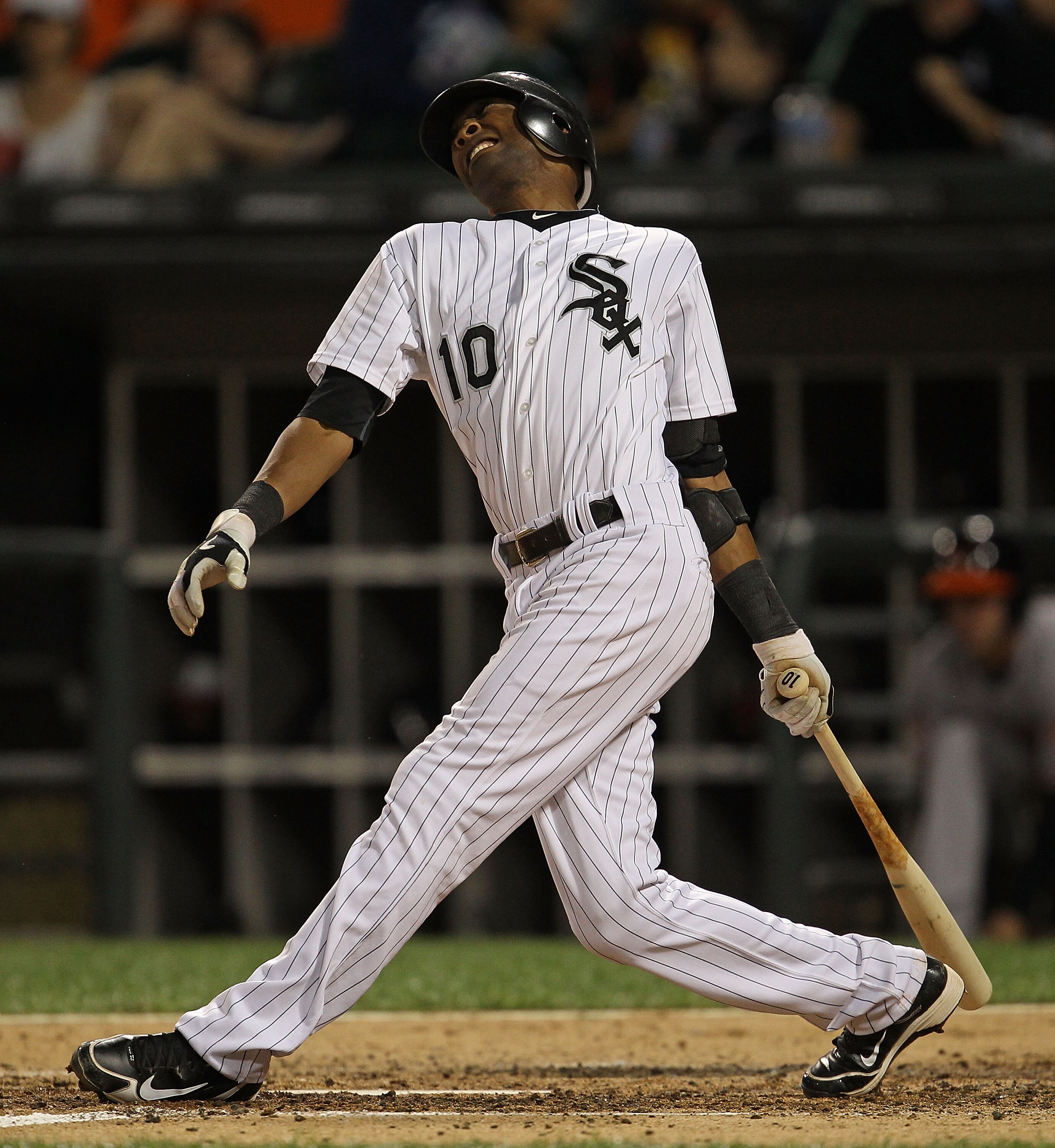 CHICAGO - AUGUST 25: Alexei Ramirez #10 of the Chicago White Sox winces after fouling a ball off of his foot during a game against the Baltimore Orioles at U.S. Cellular Field on August 25, 2010 in Chicago, Illinois. The Orioles defeated the White Sox 4-2