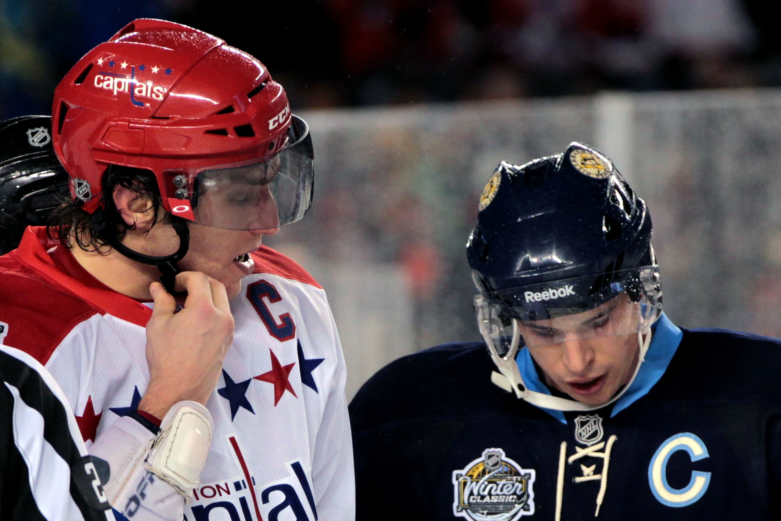 PITTSBURGH, PA - JANUARY 01:  Alex Ovechkin #8 of the Washington Capitals and Sidney Crosby #81 of the Pittsburgh Penguins are seen during the 2011 NHL Bridgestone Winter Classic at Heinz Field on January 1, 2011 in Pittsburgh, Pennsylvania. Washington wo