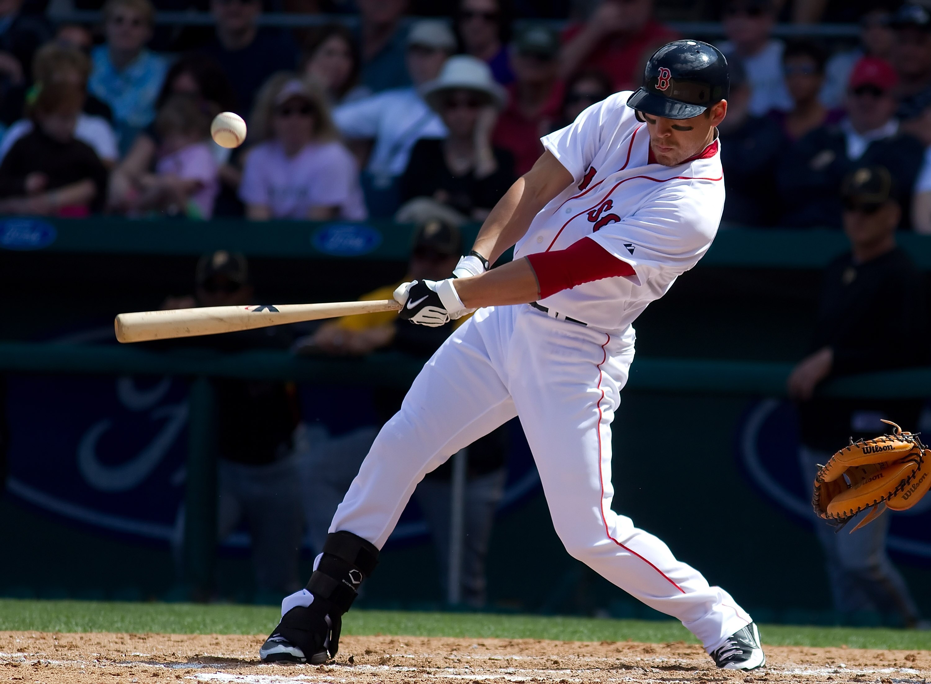 FORT MYERS, FL - MARCH 13:  Outfielder Jacoby Ellsbury #2 of the Boston Red Sox fouls off a pitch against the Pittsburgh Pirates during a Grapefruit League Spring Training Game at City of Palms Park on March 13, 2010 in Fort Myers, Florida.  (Photo by J.