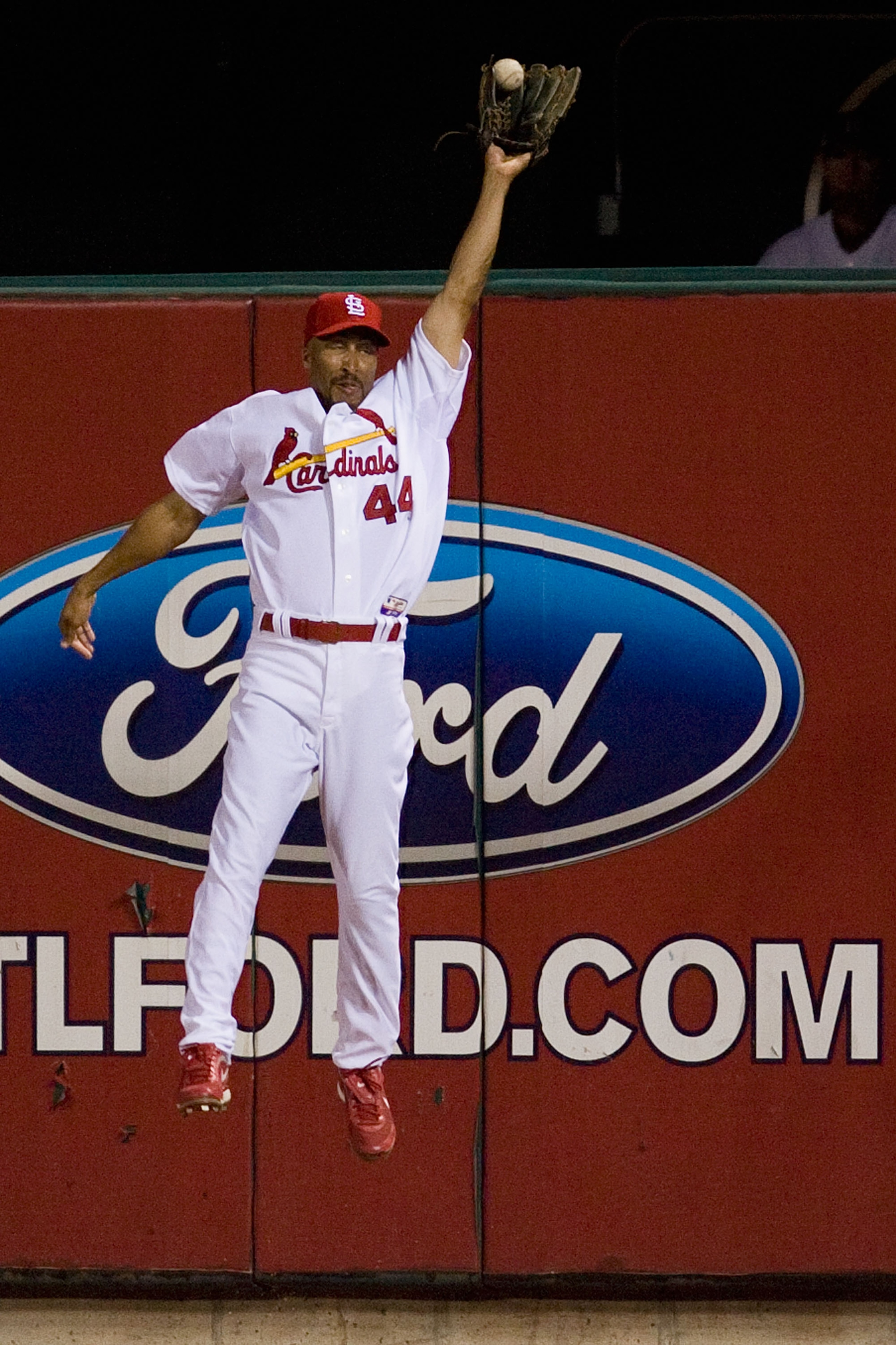 ST. LOUIS - JUNE 28:  Randy Winn #44 of the St. Louis Cardinals allows a home run as he attempts to haul in a fly against the Arizona Diamondbacks at Busch Stadium on June 28, 2010 in St. Louis, Missouri.  The Cardinals beat the Diamondbacks 6-5 in the bo