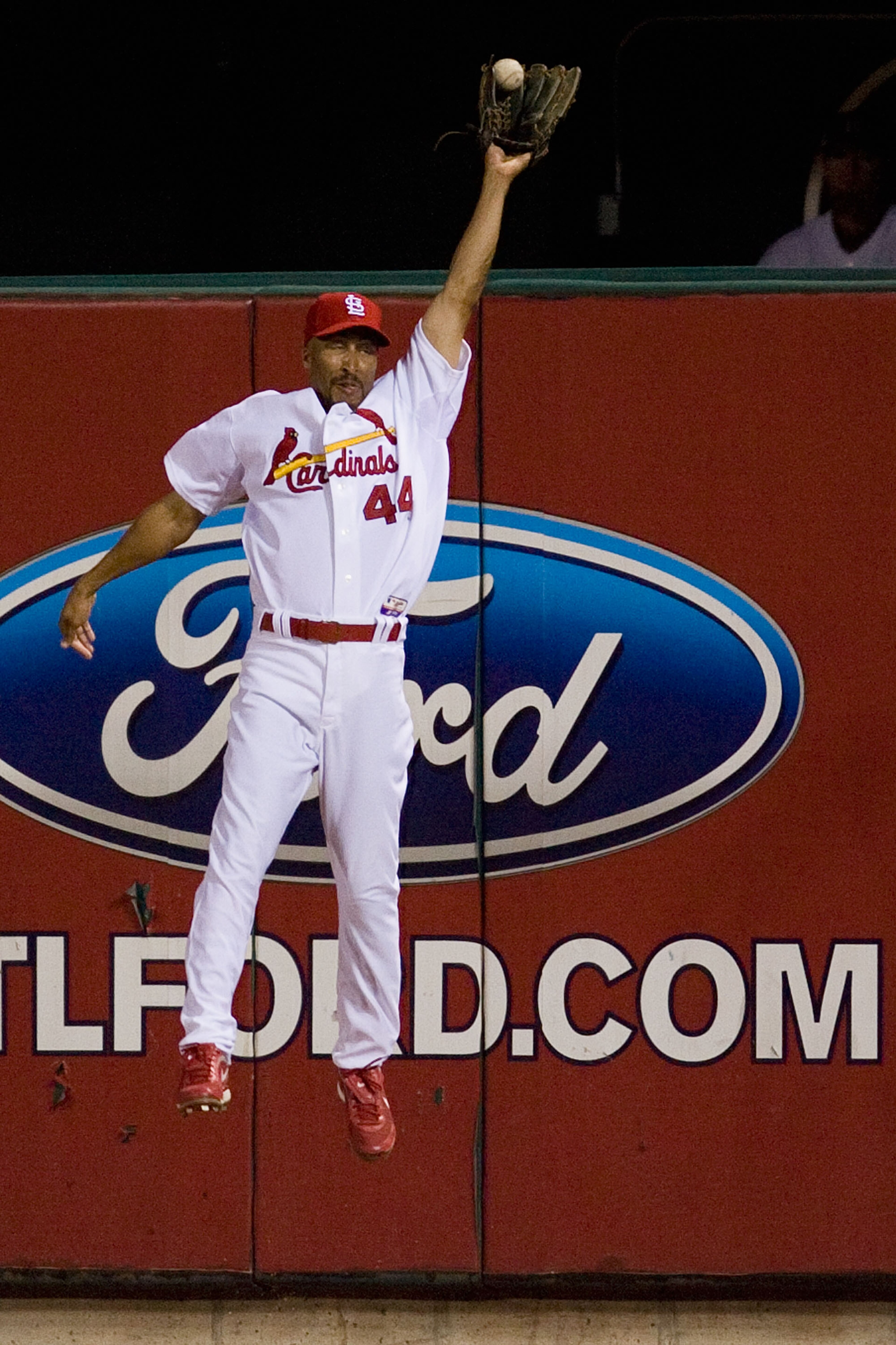 ST. LOUIS - JUNE 28:  Randy Winn #44 of the St. Louis Cardinals allows a home run as he attempts to haul in a fly against the Arizona Diamondbacks at Busch Stadium on June 28, 2010 in St. Louis, Missouri.  The Cardinals beat the Diamondbacks 6-5 in the bo