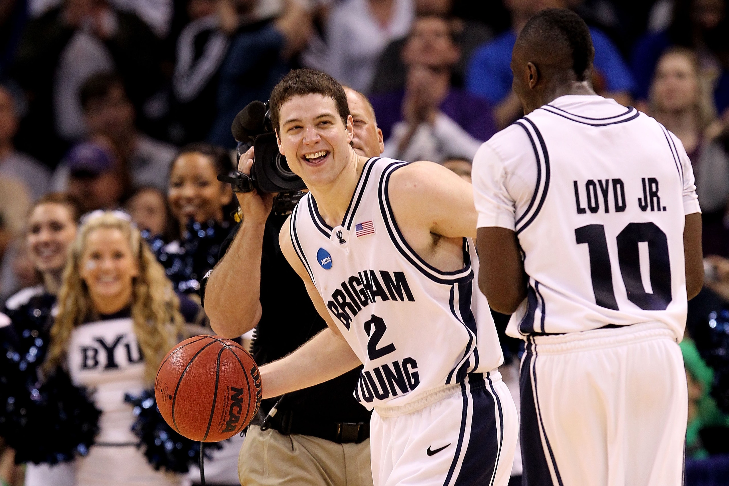 OKLAHOMA CITY - MARCH 18:  Jimmer Fredette #32 and Michael Loyd Jr. #10 of the BYU Cougars celebrate after BYU won in 99-92 double in overtime against the Florida Gators during the first round of the 2010 NCAA menï¿½s basketball tournament at Ford Center on