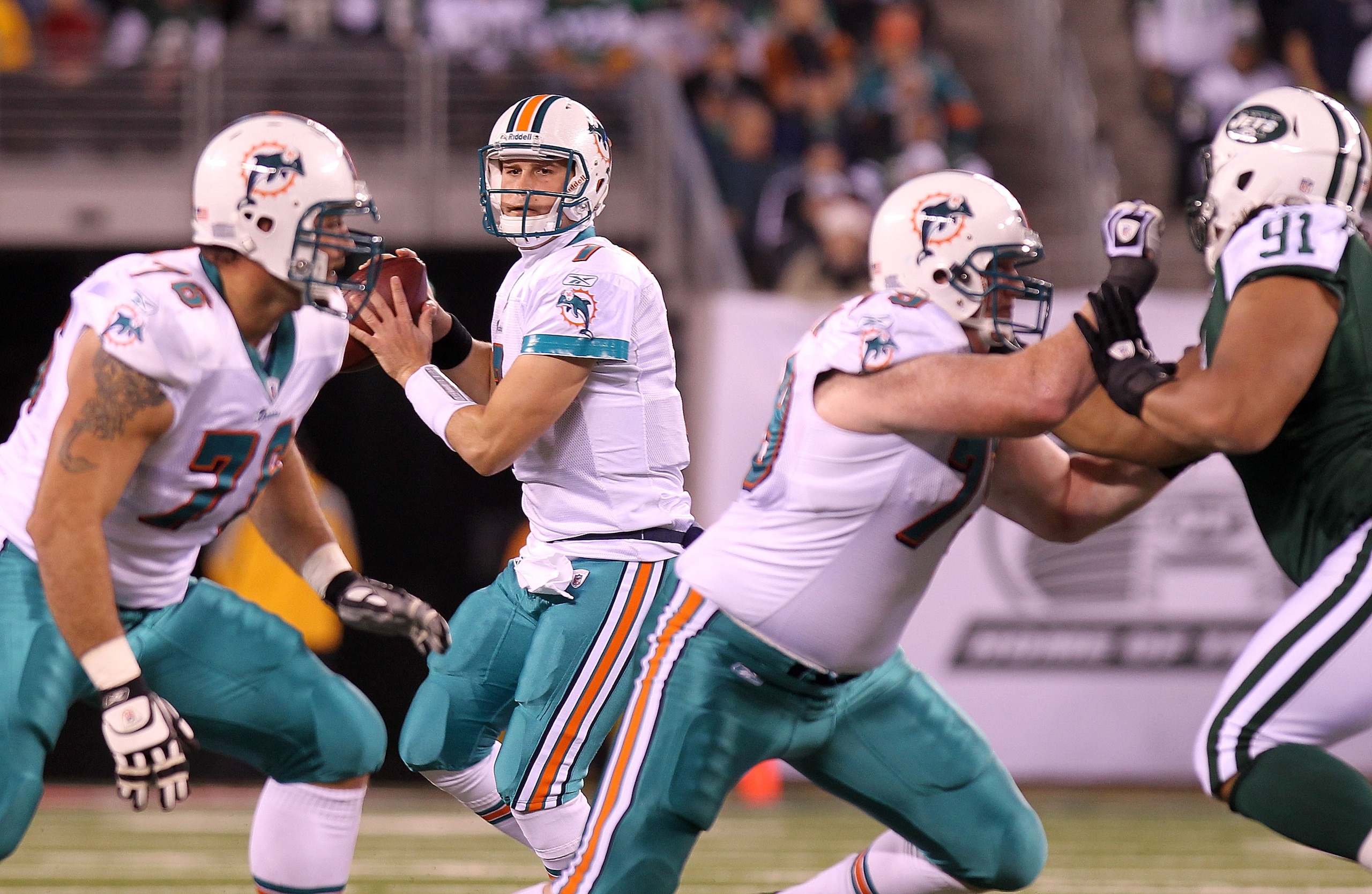 EAST RUTHERFORD, NJ - DECEMBER 12: Chad Henne #7 of the Miami Dolphins drops back to pass against the New York Jets at New Meadowlands Stadium on December 12, 2010 in East Rutherford, New Jersey. (Photo by Nick Laham/Getty Images) EAST RUTHERFORD, NJ - DECEMBER 12: Chad Henne #7 of the Miami Dolphins drops back to pass against the New York Jets at New Meadowlands Stadium on December 12, 2010 in East Rutherford, New Jersey. (Photo by Nick Laham/Getty Images)