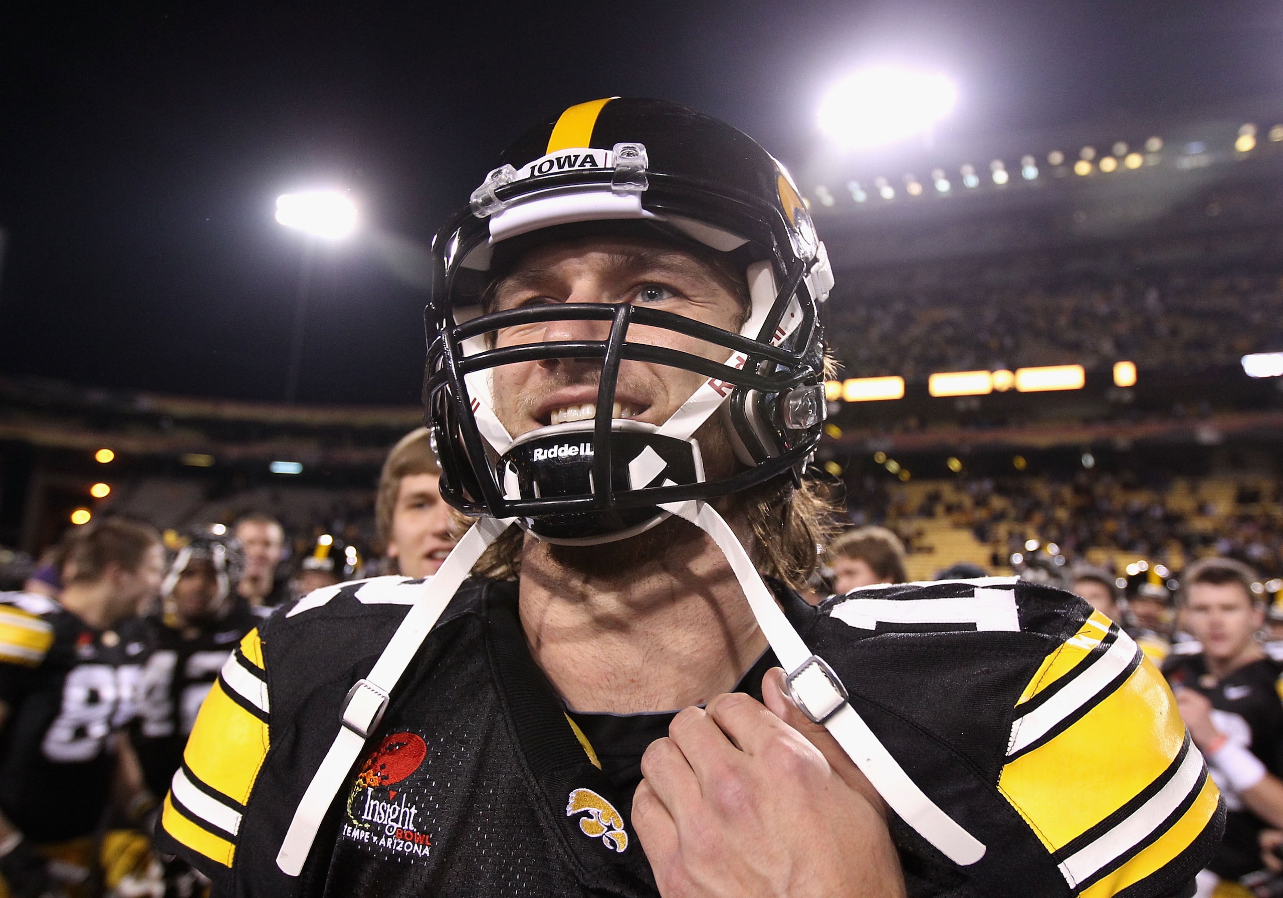 TEMPE, AZ - DECEMBER 28:  Quarterback Ricky Stanzi #12 of the Iowa Hawkeyes walks off the field after defeating the Missouri Tigers in the Insight Bowl at Sun Devil Stadium on December 28, 2010 in Tempe, Arizona. The Hawkeyes defeated the Tigers 27-24.  (
