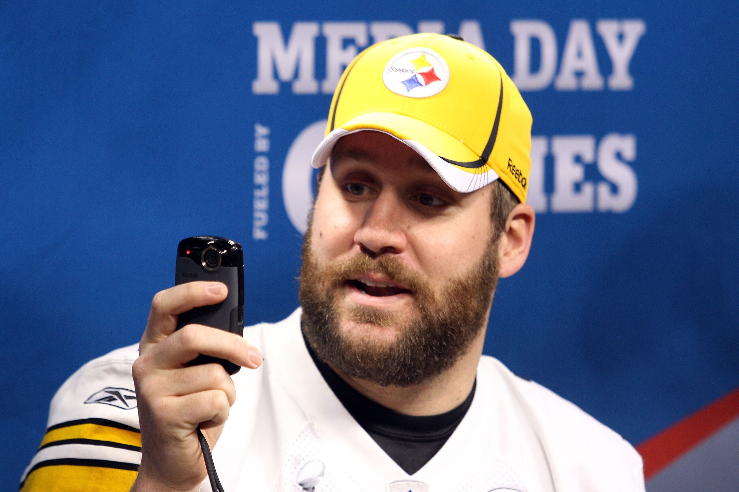 ARLINGTON, TX - FEBRUARY 01: Quarterback Ben Roethlisberger #7 of the Pittsburgh Steelers uses his phone as he is up on the pdium during Super Bowl XLV Media Day ahead of Super Bowl XLV at Cowboys Stadium on February 1, 2011 in Arlington, Texas. The Pitt ARLINGTON, TX - FEBRUARY 01: Quarterback Ben Roethlisberger #7 of the Pittsburgh Steelers uses his phone as he is up on the pdium during Super Bowl XLV Media Day ahead of Super Bowl XLV at Cowboys Stadium on February 1, 2011 in Arlington, Texas. The Pitt