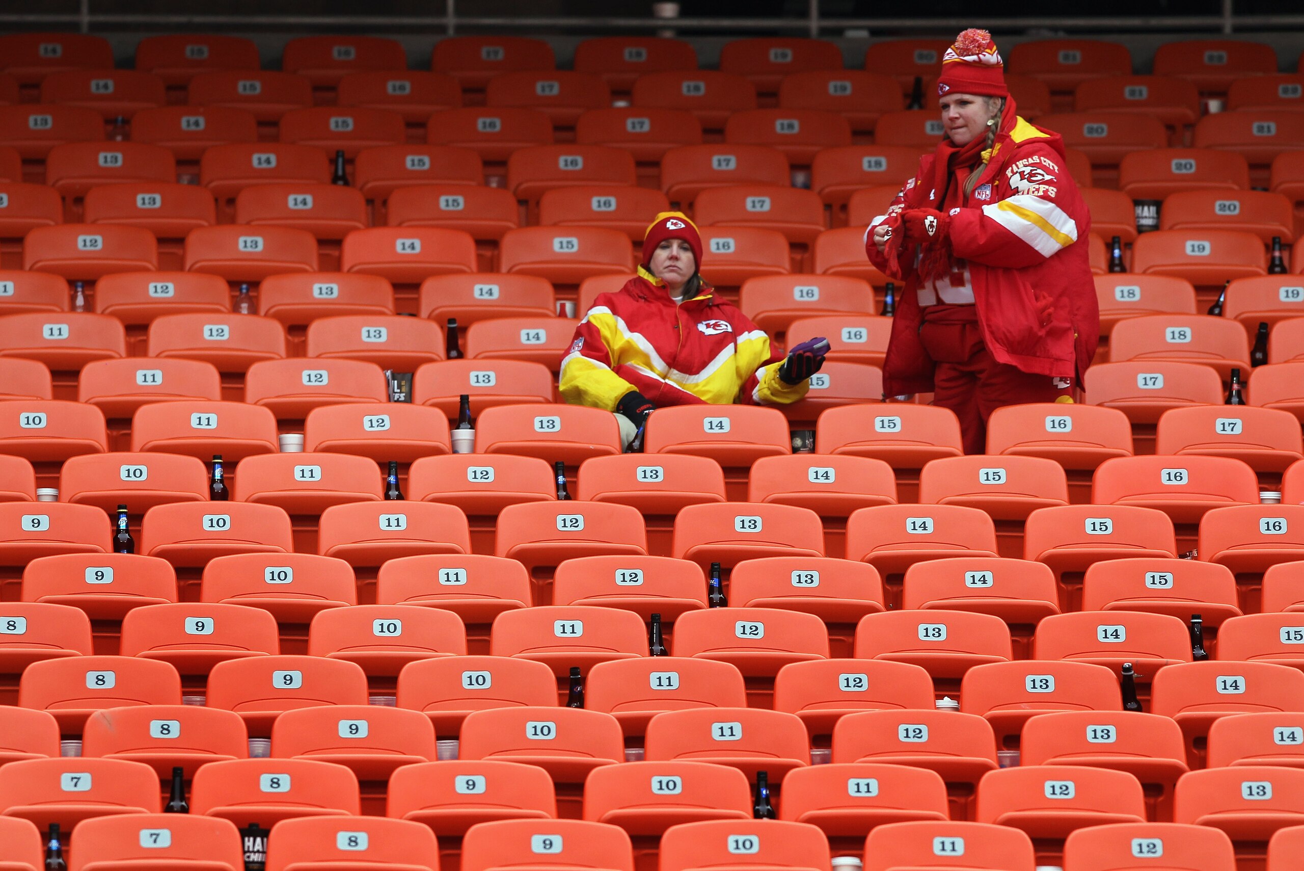 KANSAS CITY, MO - JANUARY 09: Fans of the Kansas City Chiefs sit in the stands after the Baltimore Ravens defeated the Chiefs 30-7 in the 2011 AFC wild card playoff game at Arrowhead Stadium on January 9, 2011 in Kansas City, Missouri. (Photo by Doug Pe KANSAS CITY, MO - JANUARY 09: Fans of the Kansas City Chiefs sit in the stands after the Baltimore Ravens defeated the Chiefs 30-7 in the 2011 AFC wild card playoff game at Arrowhead Stadium on January 9, 2011 in Kansas City, Missouri. (Photo by Doug Pe