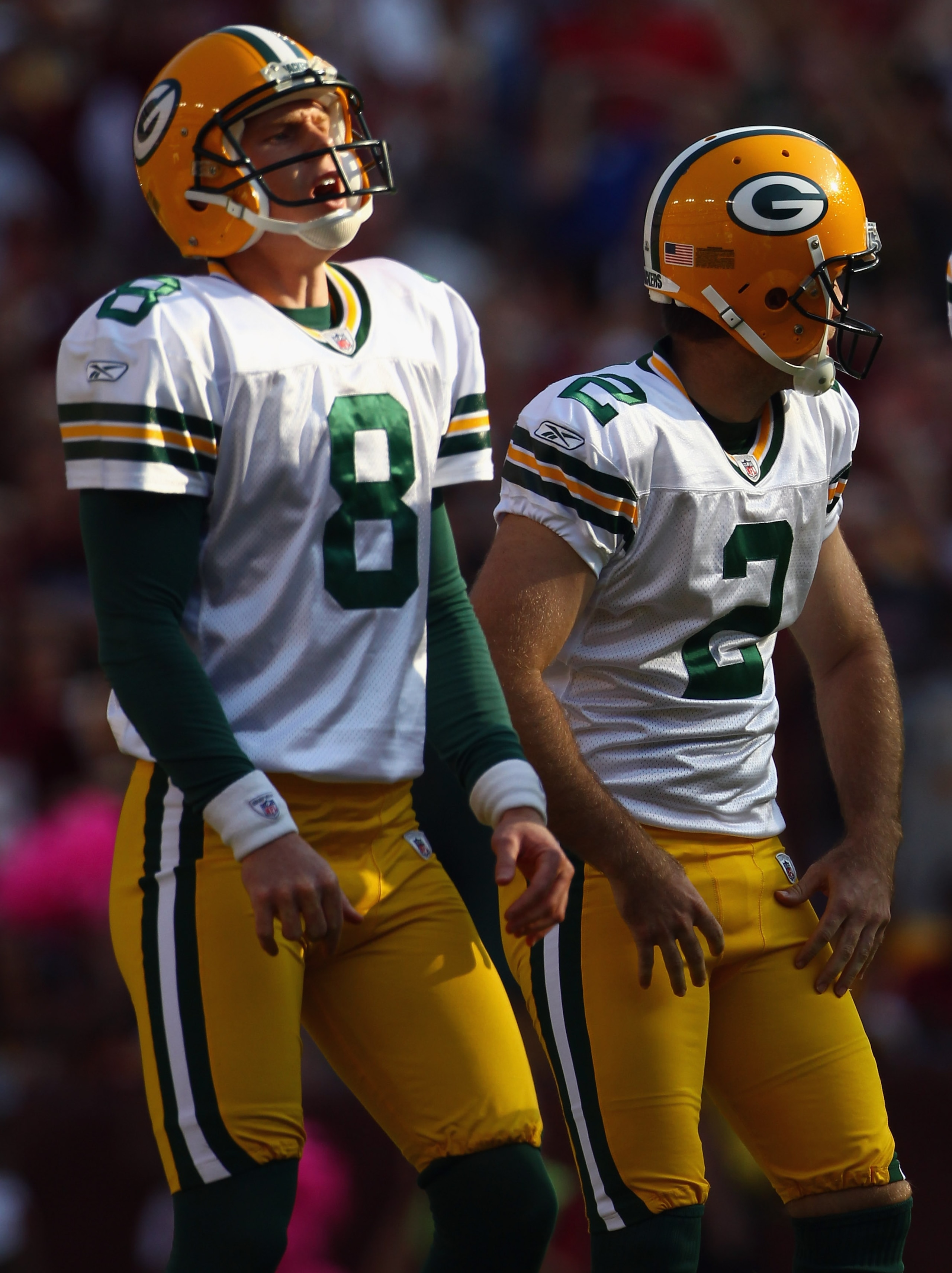 LANDOVER, MD - OCTOBER 10: Kicker Mason Crosby #2 and punter and placekick holder Tim Masthay #8 of the Green Bay Packers react to Crosby's missed field goal in the fourth quarter that would have won the game against the Washington Redskins at FedExField