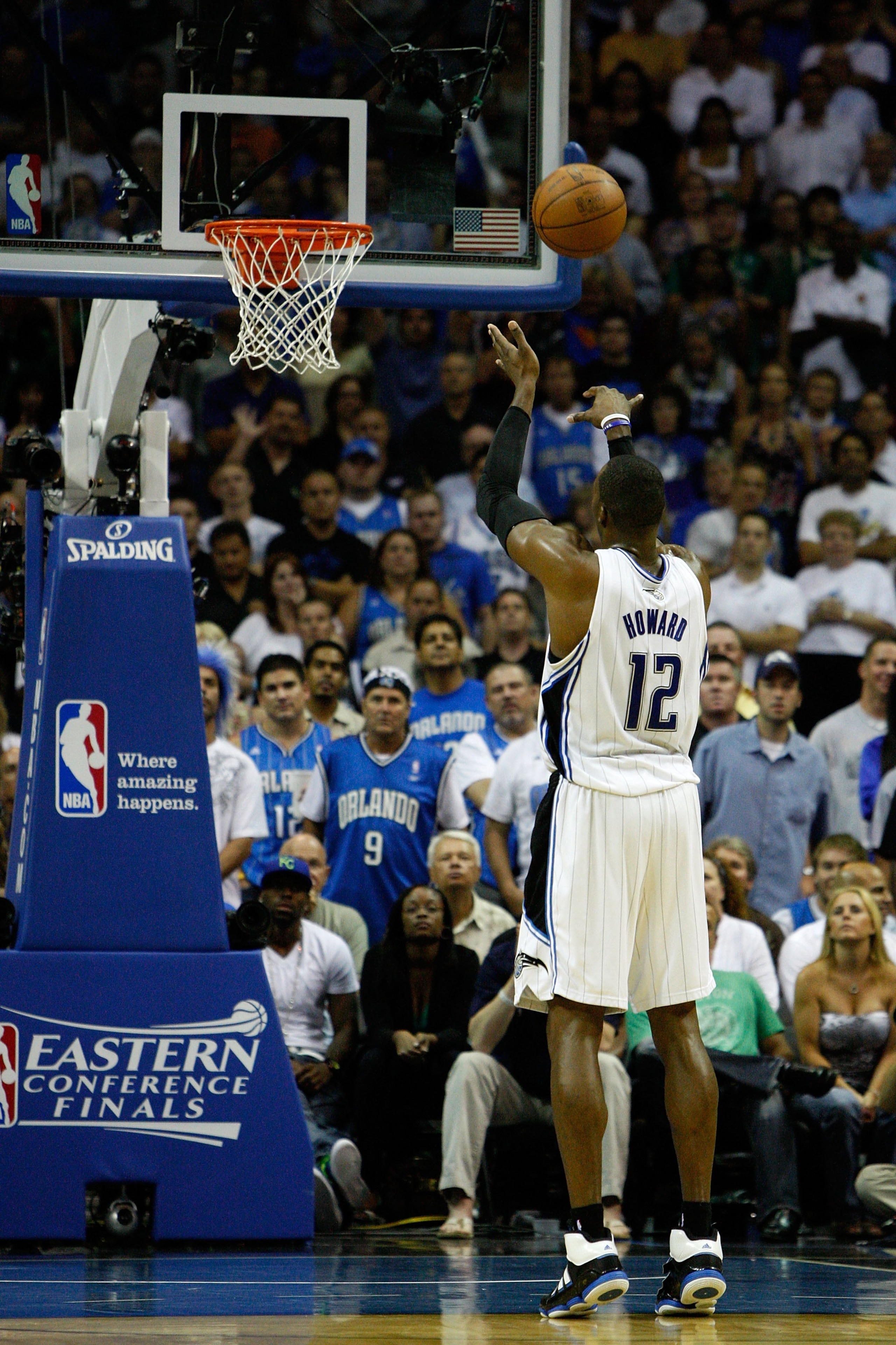 ORLANDO, FL - MAY 18:  Dwight Howard #12 of the Orlando Magic attempts a free throw against the Boston Celtics in Game Two of the Eastern Conference Finals during the 2010 NBA Playoffs at Amway Arena on May 18, 2010 in Orlando, Florida.  NOTE TO USER: Use