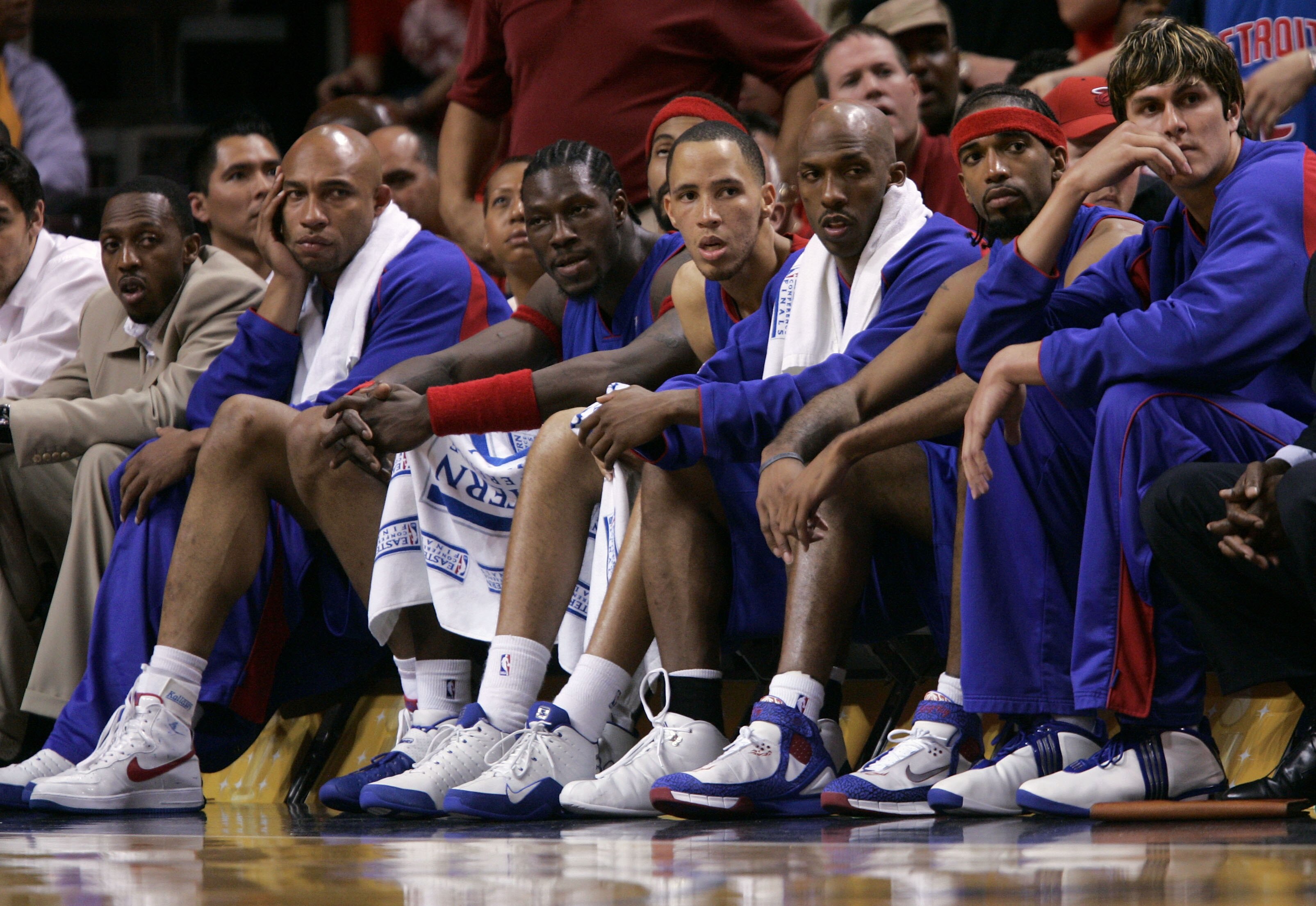 MIAMI - JUNE 2:  (L-R) Horace Jenkins, Darvin Ham #8, Ben Wallace #3, Tayshaun Prince #22, Chauncey Billups #1, Richard Hamilton #32 and Darko Milicic #31 of the Detroit Pistons sit on the bench dejected in the final minutes of their 88-76 loss to the Mia