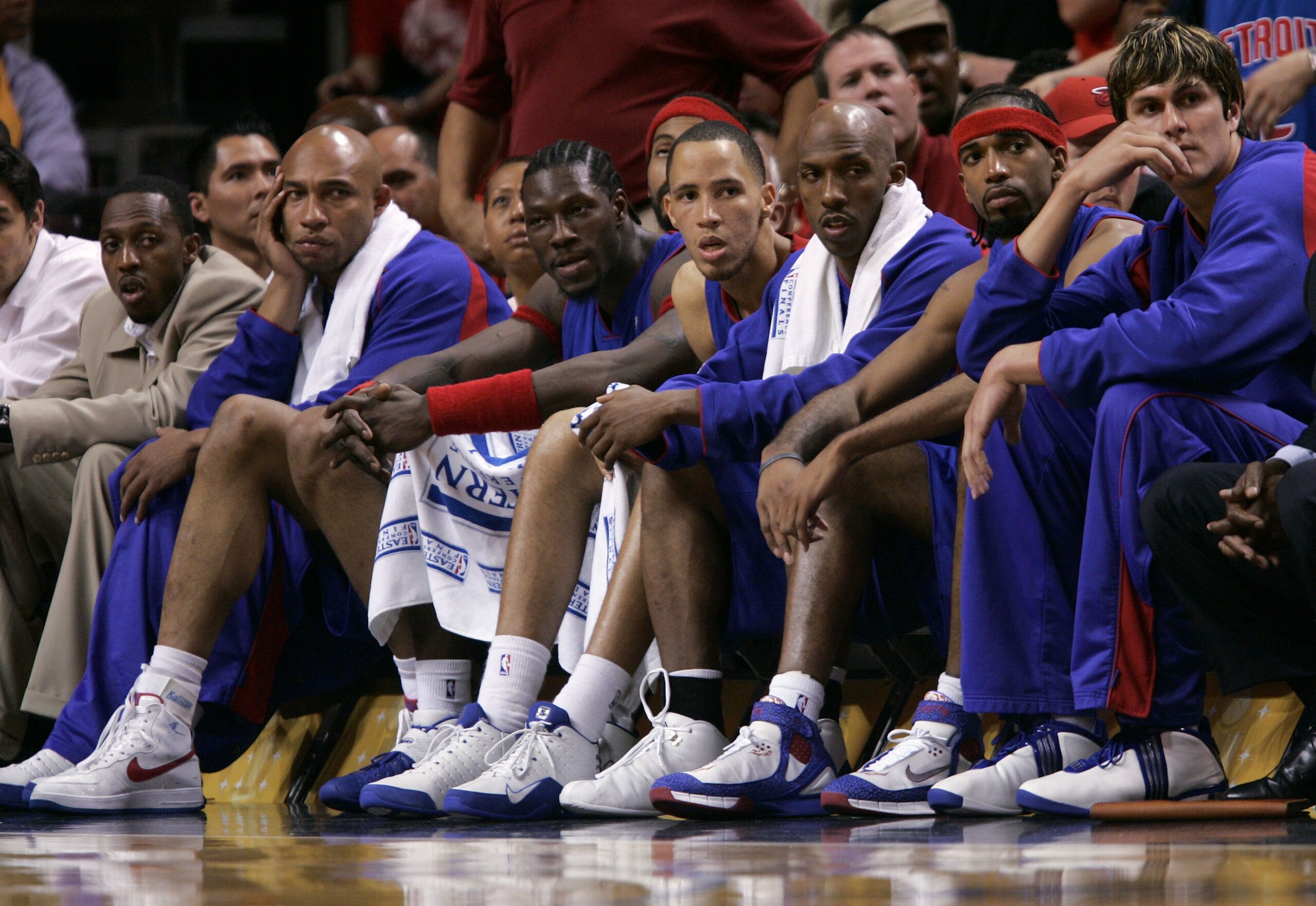 MIAMI - JUNE 2:  (L-R) Horace Jenkins, Darvin Ham #8, Ben Wallace #3, Tayshaun Prince #22, Chauncey Billups #1, Richard Hamilton #32 and Darko Milicic #31 of the Detroit Pistons sit on the bench dejected in the final minutes of their 88-76 loss to the Mia