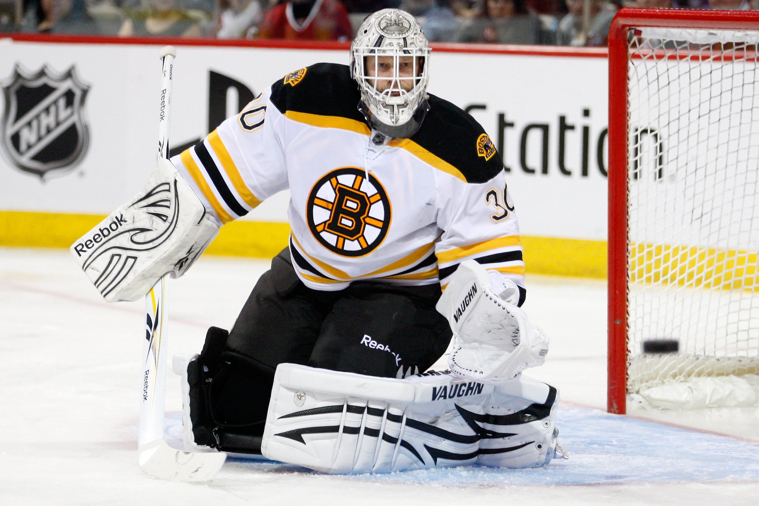 MONTREAL, CANADA - JANUARY 8:  Tim Thomas #30 of the Boston Bruins watches the rebounding puck during the NHL game against the Montreal Canadiens at the Bell Centre on January 8, 2011 in Montreal, Quebec, Canada.  The Canadiens defeated the Bruins 3-2 in